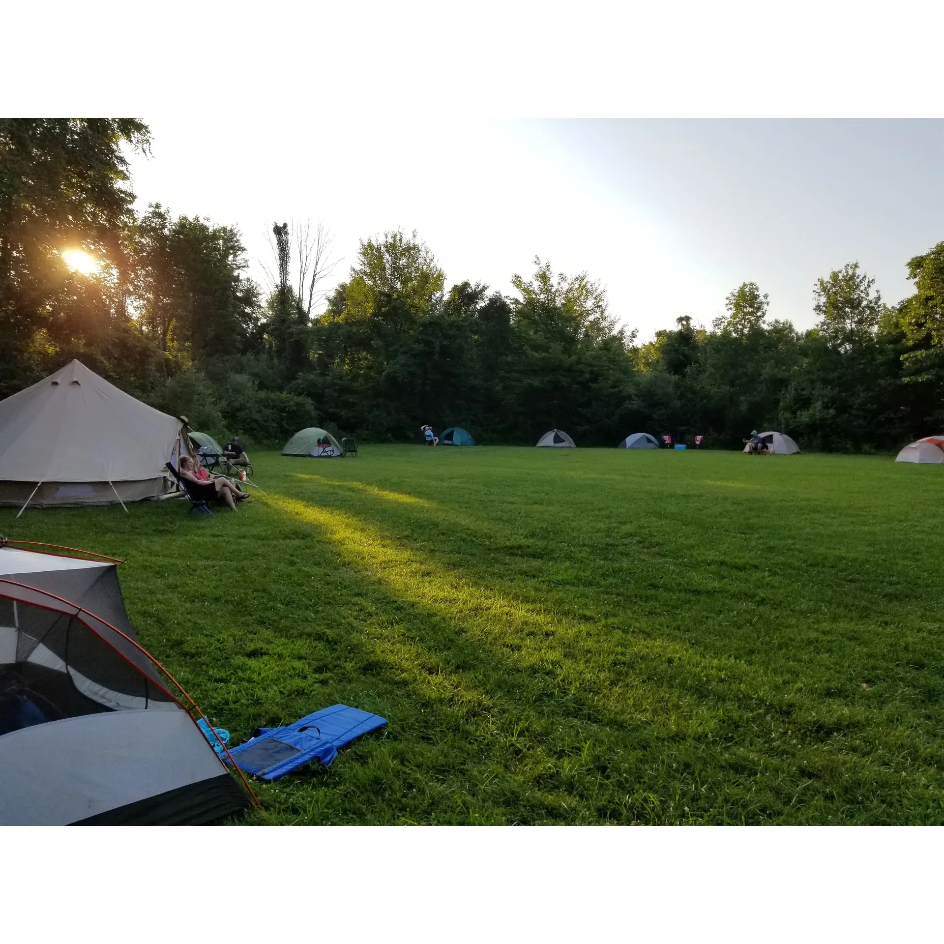 The Alum Creek State Park Group Campsite offers a serene and spacious outdoor experience, ideal for group activities and camping under the stars. Visitors are enamored by the convenience of direct water access, perfect for boating enthusiasts and anglers seeking to enjoy the tranquil lakeside ambiance. With an ample supply of water and a vast expanse to accommodate several tents, this site is a favored choice for campers looking to immerse themselves in nature.

The campsite is well-equipped for outdoor gatherings, featuring multiple fire pits and approximately six to eight picnic tables, providing the perfect setup for campfires and communal dining. The large open campground welcomes groups for a range of activities and offers a generous parking area, catering to the needs of all visitors.

Campers appreciate the substantial green space surrounded by a peaceful woodsy area, which creates a private and secluded atmosphere. A highlight for many is the opportunity to hang hammocks between conveniently spaced trees, adding to the site's relaxed and leisurely vibe.

Moreover, the proximity to the lake means spectacular views and the option to easily connect with friends or family arriving by boat. The peacefulness of the location is routinely noted, making it an idyllic retreat from the hustle and bustle of daily life. 

Alum Creek State Park Group Campsite is the perfect destination for those seeking a rustic camping experience with the comfort and the charm of Ohio's natural beauty. With its spacious grounds and picturesque lake access, this is the ideal setting for building lasting memories in the great outdoors. Description by ChatGPT.