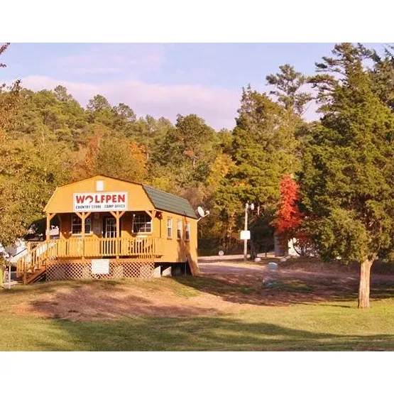 Wolf Pen Recreation Area is a serene and pristine escape for outdoor enthusiasts looking to immerse themselves in tranquility and the natural beauty of Arkansas. With a prime location on the Mulberry River, the recreation area offers an idyllic setting for a range of water-based activities. Visitors can enjoy kayaking through gentle currents, partaking in a leisurely swim, or leisurely floating on tubes, all while soaking in the picturesque surroundings.

The crystal-clear waters provide a refreshing respite, especially welcome during the warmer months. Anglers find the area agreeable for fishing, with the river fostering a sense of calm and providing a moderate challenge to their skills. Surrounding the waters, the expansive Arkansas forest presents a perfect backdrop for exploration and hiking, offering scenic vistas and a chance to connect with nature.

For those seeking a secluded retreat, Wolf Pen Recreation Area serves as an ideal locale. The campground is praised for its cleanliness and well-maintained grounds, allowing visitors to comfortably enjoy the outdoors. The sites, which support a more primitive style of camping, enhance the experience for those looking to unwind and disconnect from the bustle of everyday life.

Despite its seclusion, the area retains accessibility for recreational journeys, such as starting a kayaking trip along the Mulberry River toward Turner Bend. With its magnificent scenery and tranquil ambiance, Wolf Pen Recreation Area stands out as a special destination, inviting campers, hikers, and nature lovers to create lasting memories in its enchanting environment. Description by ChatGPT.