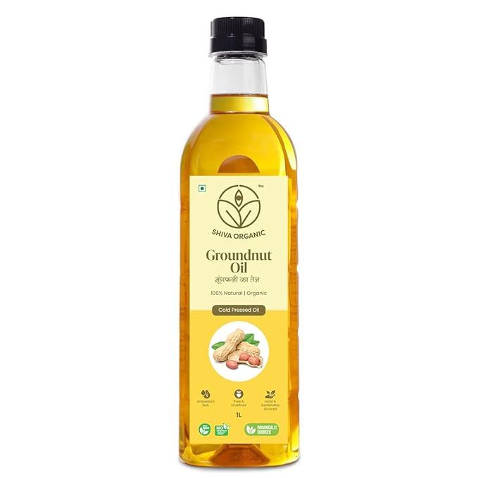 Shiva Organic Cold-Pressed Groundnut Oil is a high-quality, 100% natural oil that is certified organic. It is made from carefully selected groundnuts that are cold-pressed to retain their natural nutrients and flavors. This oil is rich in monounsaturated fats, making it a healthy option for cooking, frying, and various other culinary uses.