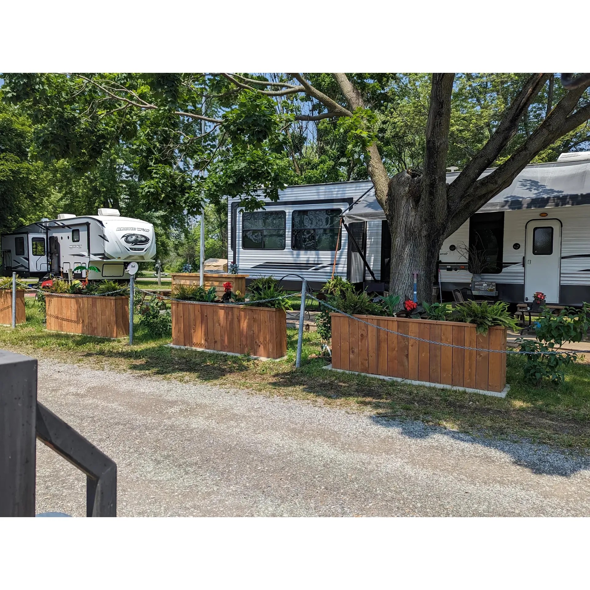 Grenville Park Camping & RV Park offers an escape into the great outdoors, providing an idyllic setting for both seasoned campers and those seeking to immerse themselves in the tranquility of nature. The park boasts a range of campsites that cater to various preferences, including scenic sites with breathtaking views of the St. Lawrence Seaway. Guests repeatedly commend the park's picturesque landscapes and ample amenities that enhance the camping experience.

The grounds are a paradise for outdoor enthusiasts. Seasonal camping patrons find themselves returning year after year, drawn by the park's enduring allure and the plethora of features available. The inviting atmosphere extends to those who choose glam camping, with many commending the park's spacious individual sites, surrounded by majestic mature trees, that offer a perfect blend of comfort and nature.

Families, couples, and singles can all find enjoyment with the park's on-site entertainments. Children can revel in the dedicated park areas along the water, which provide safe and engaging spaces for play. While adventurers seeking relaxation can bask in the pristine beaches and sand bars, offering a serene environment for leisure and contemplation.

The warmth of the community shines through the park's staff and seasonal residents, praised for their graciousness, helpfulness, and professionalism. They ensure that each guest feels welcomed and attended to, from settling into their site to accommodating everyday needs. Even without a septic system, the park provides convenient alternatives such as a weekly pump-out service, ensuring that guests' stays are comfortable and hassle-free.

Grenville Park Camping & RV Park is committed to creating memorable experiences for its visitors. With its harmonious blend of nature, neighborliness, and quality service, it stands as an outstanding choice for those seeking to enjoy nature and find peace away from the bustle of daily life. It's a gem that encourages rest, play, and the making of lasting memories under the open sky. Description by ChatGPT.