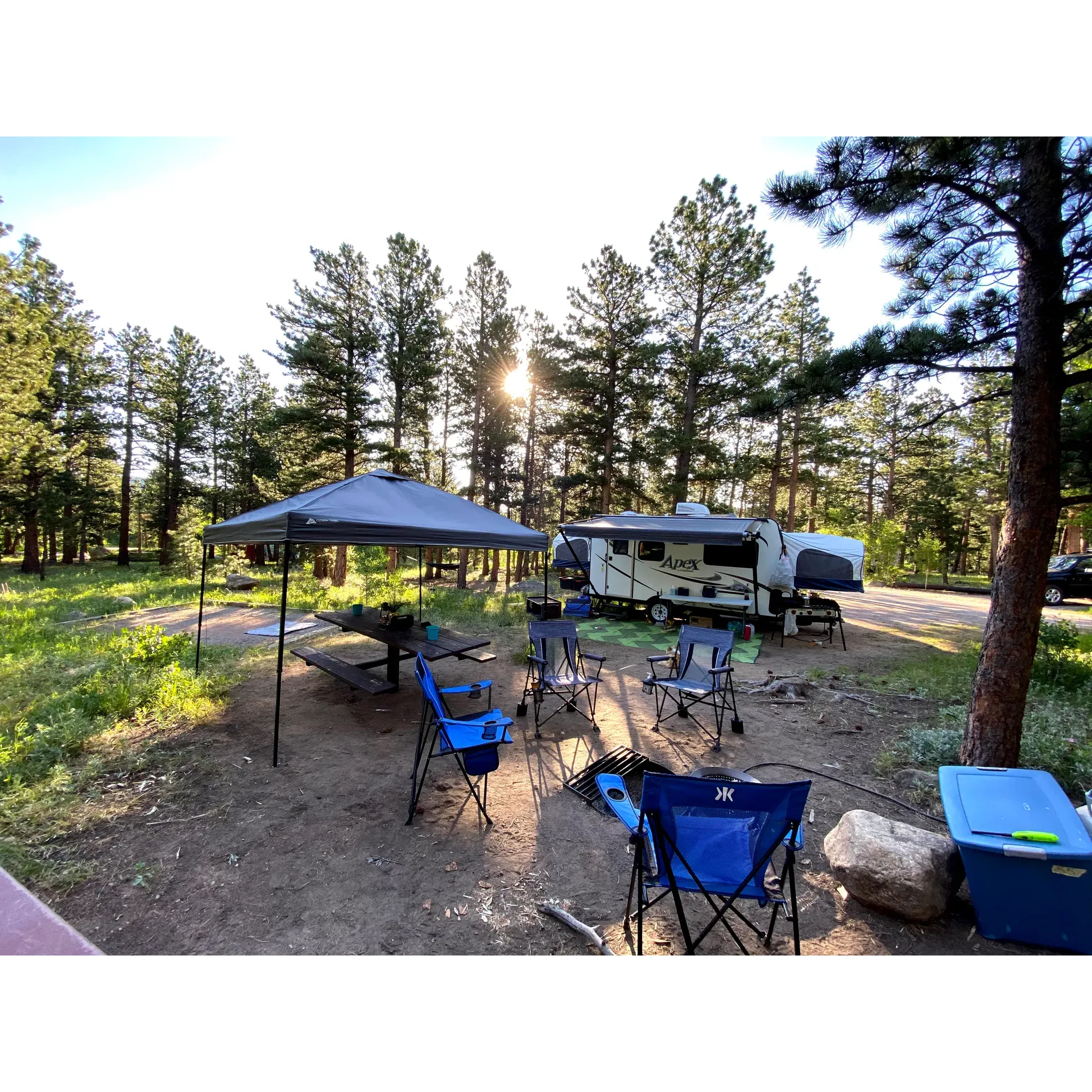 Olive Ridge Campground offers a serene getaway at a remarkable value, where visitors can immerse themselves in the splendor of nature without breaking the bank. Boasting spacious and reasonably priced campsites located not far from the charming towns of Estes Park and Lyons, this campground provides the perfect balance between solitude and convenience.

Drawn by the allure of the majestic Rocky Mountains and the enchanting Wild Basin area, guests find Olive Ridge Campground to be an ideal home base for outdoor exploration. The tall, fragrant pine trees offer a canopy of tranquility and freshness, enhancing the experience of every camper seeking respite from the bustling city life.

Guests often praise the campground for maintaining clean facilities, highlighting the restrooms that are kept in good condition. This destination has earned the appreciation of families and individuals alike, with park rangers known for their kindness and friendliness, contributing to the warm and welcoming atmosphere of this outdoor haven.

Whether you're looking to forge memories with family or enjoy personal reflection surrounded by wildlife, Olive Ridge Campground accommodates with its somewhat secluded sites, giving a sense of privacy amid the forested landscape. It’s an exceptional spot for those planning a visit earlier in the week to take full advantage of the tranquility and natural beauty on offer.

Moreover, those venturing to Olive Ridge Campground find themselves in close proximity to Rocky Mountain National Park, where adventurers and nature enthusiasts can witness an array of wildlife and partake in countless activities. With such a coveted location and its budget-friendly rates, this campground invites all who wish to experience the outdoors while enjoying a comfortable and accommodating setting. Description by ChatGPT.