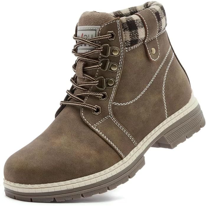 ANJOUFEMME Casual Winter Hiking Boots for Women are designed for outdoor activities in cold weather conditions. These boots are waterproof and insulated with a fur lining to keep your feet warm and dry. The lightweight design and lace-up closure ensure a comfortable and secure fit for long walks or hikes.