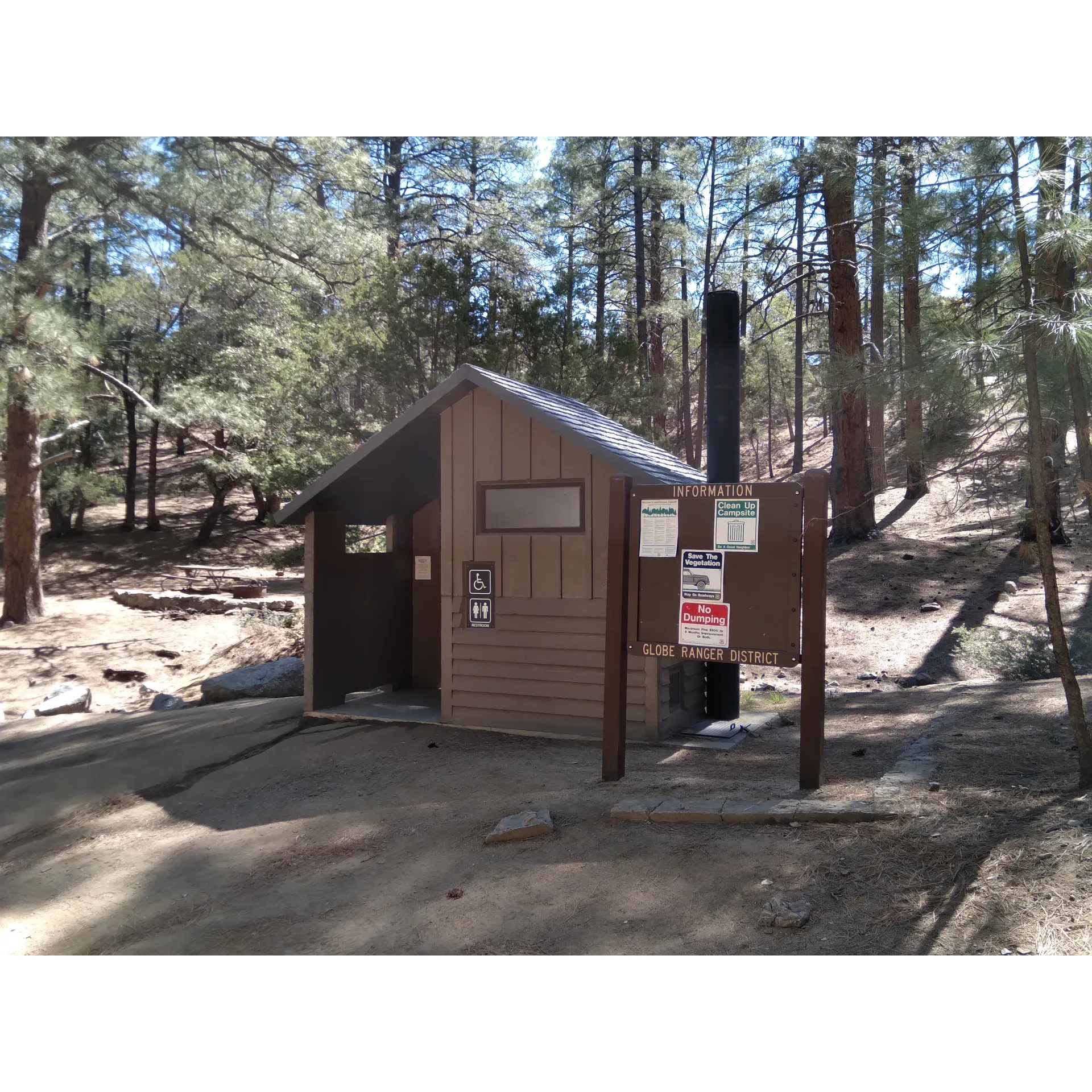 Sulphide Del Ray Campground offers a tranquil escape into the great outdoors, complemented by the comfort of well-maintained amenities and the beauty of its natural surroundings. Guests can expect to find a serene setting perfect for a peaceful retreat, where the resplendent scenery serves as the perfect backdrop for a restful stay.

Visitors will appreciate the generous shade and shelter provided by the camp's thoughtful layout, creating an ideal environment for relaxation away from the elements. The journey to the campground is an experience in itself, with a scenic road that unveils the area's picturesque views, stimulating the senses and setting the stage for an intimate encounter with nature.

Once at the campground, you'll find a selection of campsites equipped with sturdy fire rings and convenient picnic tables, inviting guests to enjoy outdoor meals and cozy evenings around the campfire. The limited number of tent sites underscores the intimacy and rustic charm of the campground, making it an idyllic setting for those seeking a quieter, more secluded getaway.

The facilities, including a beautifully maintained outhouse, reflect the campground's commitment to cleanliness and environmental stewardship. For those looking for modern conveniences amidst the wilderness, the campground provides a detectable AT&T signal in select areas.

Sulphide Del Ray Campground is a destination for those who value the natural elegance of the landscape and the pleasure of simple, rustic living. Its inviting atmosphere and splendid isolation are ideal for visitors pursuing a tranquil camping experience and a refreshing break from the commotion of everyday life. Description by ChatGPT.