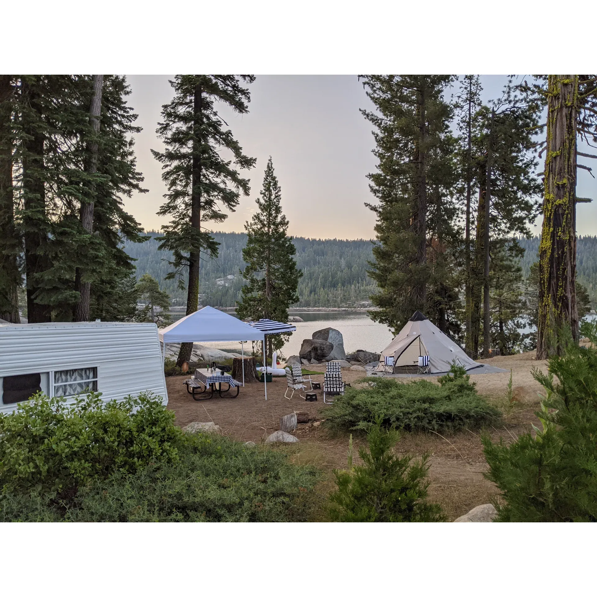 USFS Sugar Pine Point Campground is a picturesque outdoor retreat boasting magnificent views of the lake and an idyllic setting for stargazing. Visitors are encouraged to immerse themselves in the serene atmosphere, where the natural beauty of the surrounding forest and the glistening water set the scene for a tranquil getaway. The amenities include a bathroom facility for the convenience of campers. While planning your visit, do remember to bring an ample supply of water to enhance your comfort during the stay.

Adventure-seekers will appreciate the refreshing reservoir waters, which remain pleasantly cool for an invigorating swim. The supportive and welcoming camp hosts contribute to a remarkable camping experience, going out of their way to ensure a memorable visit. Future campers looking forward to reconnecting with nature and relishing the great outdoors will find USFS Sugar Pine Point Campground an ideal place to set up camp.

With a selection of sites offering sweeping lake views and shaded by majestic trees, there is ample opportunity to find the perfect spot to suit your preference for privacy or openness. Here, the beauty of the landscape creates a stunning backdrop for your camping adventures, with select sites providing the perfect balance between seclusion and breathtaking vistas.

Visitors leave with fond memories of their time spent lakeside, often planning their return to one of the most scenic spots to enjoy camping under the vast skies. At USFS Sugar Pine Point Campground, every effort is made to provide an inviting and joyful camping experience amidst the grandeur of nature. Description by ChatGPT.