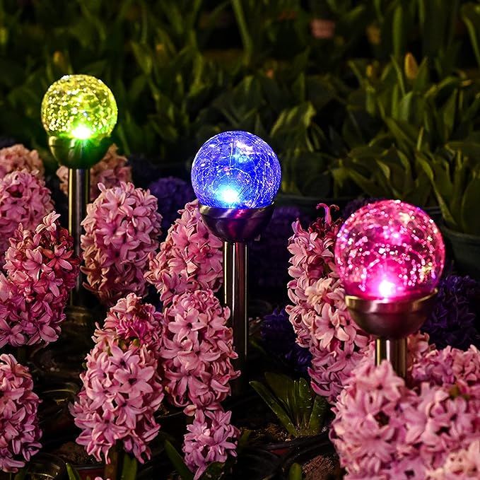 The GIGALUMI Solar Lights Outdoor are a set of three garden lights that feature a cracked glass ball design and color-changing capability. These lights are powered by solar energy, making them a sustainable and environmentally-friendly lighting option for your outdoor spaces.