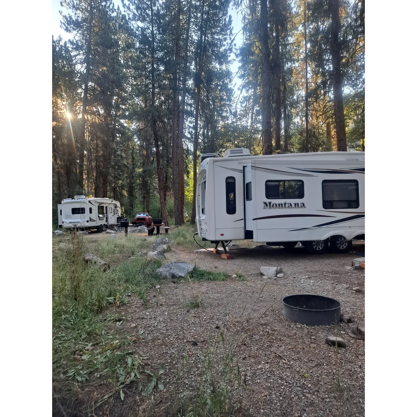 Abbot Campground offers an idyllic escape for those looking to immerse themselves in serene natural beauty. Conveniently located a short journey from Boise and situated along a picturesque river, this destination is a favored spot for those in search of tranquility and outdoor adventure. Imagine waking up to the gentle sounds of a flowing river and the sight of sunlight filtering through an ample canopy of lush trees that envelop the entire area. 

The well-maintained trails beckon hikers of all skill levels to explore and discover the untouched splendor of the Boise National Forest that cradles the campground. The inviting terrain is a hiker's delight, ensuring a memorable experience with each step along paths that reveal the enchanting secrets of the forest.

Abbot Campground is not only known for its scenic charm but also for its vibrant holiday spirit during certain times of the year. Guests have made it a tradition to celebrate the 4th of July week here because of its proximity to the annual Featherville parade, adding a delightful dose of community and festivity to the natural allure of the surroundings.

Whether you're visiting for a peaceful retreat or to enjoy the local celebrations, the campground catitudes to all with spacious sites that accommodate large RVs, offering plenty of shade and amenities for a comfortable stay. The campground is an oasis for both relaxation and celebration, beautifully blending the joys of the great outdoors with the comforts of a well-appointed camping destination. For those seeking a harmonious balance of solitude and community, Abbot Campground stands out as a preferred choice. Description by ChatGPT.