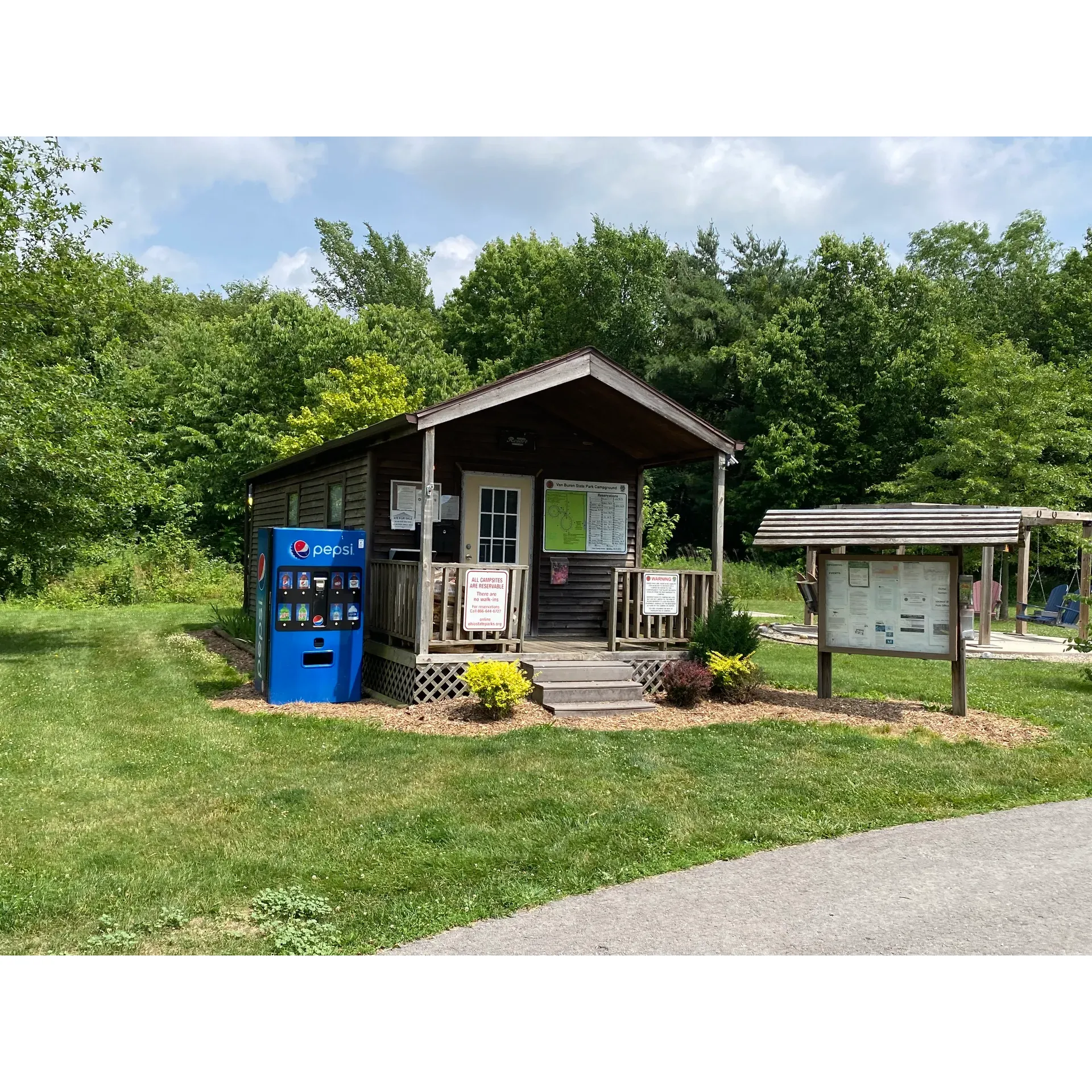 Van Buren State Park Campground is a serene destination for outdoor enthusiasts and families seeking a tranquil retreat. Guests have the opportunity to immerse themselves in the great outdoors, with both family-friendly and horse camping options available. Visitors commend the spacious and well-looked-after campsites, ensuring a comfortable stay. Many sites boast convenient amenities such as electrical hook-ups and paved areas, accommodating a range of camping preferences.

Enveloped by an aura of peace, this charming campground is surrounded by a plethora of hiking trails, allowing nature lovers to explore the scenic surroundings extensively. The campground offers level parking spots, some of which are paved, ensuring easy access and setup for RVs and trailers. Additionally, cleanliness and comfort are top priorities, as reflected in the pristine bathroom facilities that are well-maintained and odor-free.

As a great little park for camping, the grounds feature electric-only hookups, providing guests with the essential power they need. For water services, a potable water spigot conveniently located at the entrance to the camping circle is available for visitors' use. Although the dump station is situated a short drive from the campgrounds, it ensures that all needs are catered to for a complete camping experience.

For those planning a visit, reserving a spot is made easy through a phone call to the Ohio Department of Natural Resources (ODNR), and you also have the potential to witness exceptional natural events, such as an eclipse, depending on the season. With its scenic setting, ample facilities, and commitment to a high standard of maintenance, Van Buren State Park Campground stands as an inviting location for a memorable and relaxing getaway amidst nature's embrace. Description by ChatGPT.