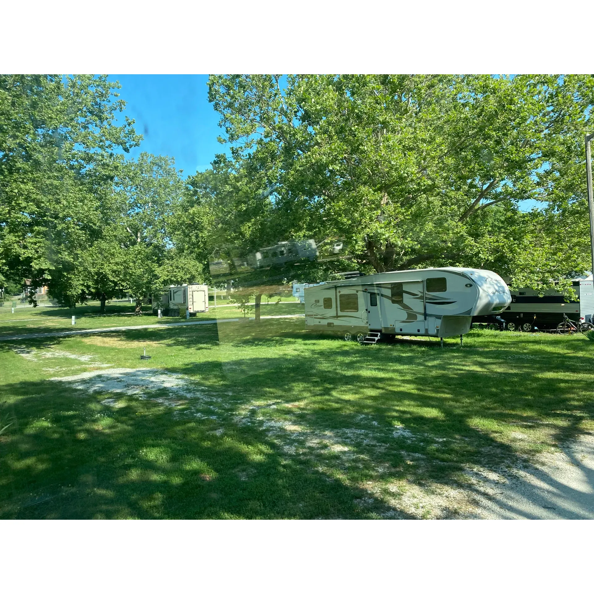 Pottawattamie County Fair Campground offers a convenient and economical stay for travelers seeking a quiet retreat or a quick stopover. With full hookups—including electric, water, and sewer—visitors can ensure that their recreational vehicles are well cared for during their stay. The self-check-in process provides ease and efficiency, catering to visitors' needs for just $25 per site.

Guests are frequently impressed by the campground's easy accessibility to the highway, making it an ideal rest spot for those on long journeys. Additionally, the sense of community shines through the interactions with the host and long-term campers who go out of their way to be accommodating, showcasing the friendly and helpful atmosphere. For example, one of the long-term campers even offers a heartwarming gesture by providing transportation to nearby amenities and sharing valuable insights into the local area.

The campground's ambiance is further enriched by the presence of tall, majestic shade trees that contribute to a serene and picturesque environment. Regular comments highlight the peacefulness of the campground, making it an excellent choice for a restful night's sleep.

At the affordable price point, guests recognize the exceptional value of the campground's offerings. While the on-site bathrooms are more rustic in nature and may not be everyone's choice, those who prefer the comforts of their own facilities within their RVs are exceptionally satisfied with their experience. For travelers looking for no-frills RV camping with all the essential services, Pottawattamie County Fair Campground stands out as a pleasant and wallet-friendly option. Description by ChatGPT.