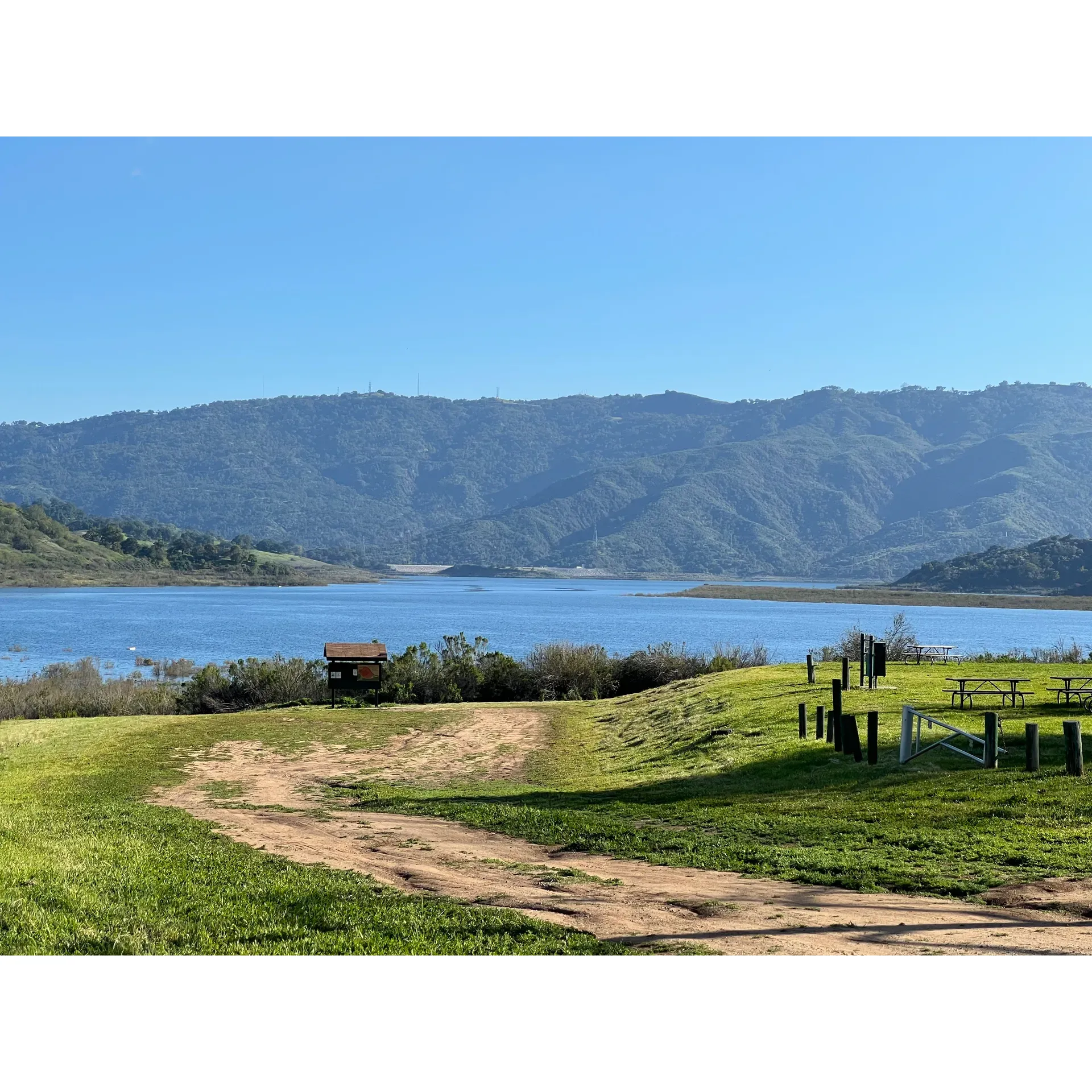 Lake Casitas Recreation Area presents an idyllic retreat for outdoor enthusiasts and families looking to immerse themselves in the vibrancy of nature. The stunning lake, thriving with marine life, presents a picturesque backdrop stunningly complemented by a sprawling campground that buzzes with the energy of happy campers. Boasting a nearly full water level as of Spring 2024, the lake's shimmering waters offer a tranquil setting for a variety of outdoor activities.

Revel in the beauty of the great outdoors with plentiful fishing spots, where anglers might chance upon the legendary Florida strain large mouth bass, a testament to the area's rich aquatic life. For those seeking terrestrial adventures, the recreation area features a challenging disc golf course, inviting both novices and experienced players for a round amid the scenic vistas.

Families can look forward to a wonderful time at the water park, a delightful respite for children and adults alike on warm sunny days. The convenience of an on-site store ensures that essentials are always within reach, while the cozy café provides a welcome spot to unwind and refuel after a day of adventure.

Boating enthusiasts will appreciate the well-maintained launch ramp, which provides smooth access for an array of watercraft, allowing for serene days spent on the water or thrilling water sports. The sense of community is tangible, with campers often gathering for shared experiences under the wide-open skies.

Acknowledging the social nature of camping, those sensitive to noise might wish to come prepared with earplugs to ensure restful nights. With such comprehensive facilities and a host of amenities, Lake Casitas Recreation Area affirms its reputation as a cherished destination, inviting everyone to create lasting memories in a setting that epitomizes the joy of outdoor recreation. Description by ChatGPT.