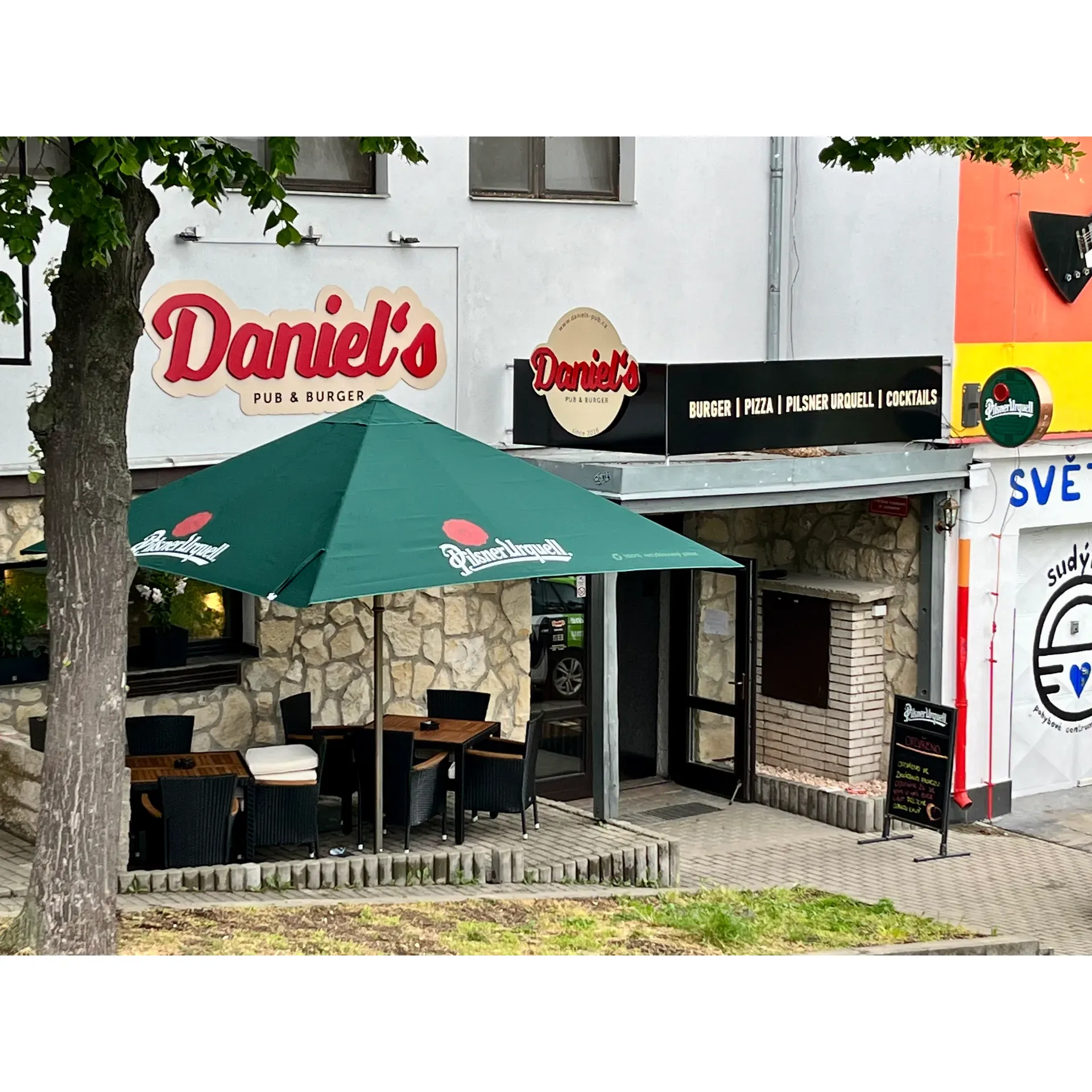 Daniel's Pub & Burger has garnered a reputation for serving what many regard as the best burgers in the entire Czech Republic. This delightful establishment is praised not only for its exceptional culinary creations but also for its warm and welcoming ambiance. Consistently hailed for its unparalleled value for money, it's a magnet for burger aficionados who seek a perfect blend of taste and affordability. 

Visitors at Daniel's often rave about the experience of letting Veronica, reputed among staff, take the reins in choosing their meals, leading to a pleasantly curated dining adventure. This spot's menu is celebrated for its impressive array of delectable dishes, right from the appetizers to the main courses and onto the desserts and drinks. Every element of the dining experience has been thoughtfully crafted to ensure satisfaction.

What truly sets Daniel's Pub & Burger apart is the super-friendly and hospitable staff who create a convivial atmosphere, making every guest feel like a regular. They are known for going above and beyond to accommodate each patron's needs, with an earnest willingness to adapt their offerings. Even for those seeking gluten-free options, the pub displays its culinary adaptability by happily preparing 'naked' burgers that maintain their famous taste profile.

With a perfect score in every category—from the place and the atmosphere to the food and service—it's clear why Daniel's Pub & Burger is a must-visit destination. As its legion of delighted diners often attest, it is undeniably a place that beckons for return visits. Description by ChatGPT.