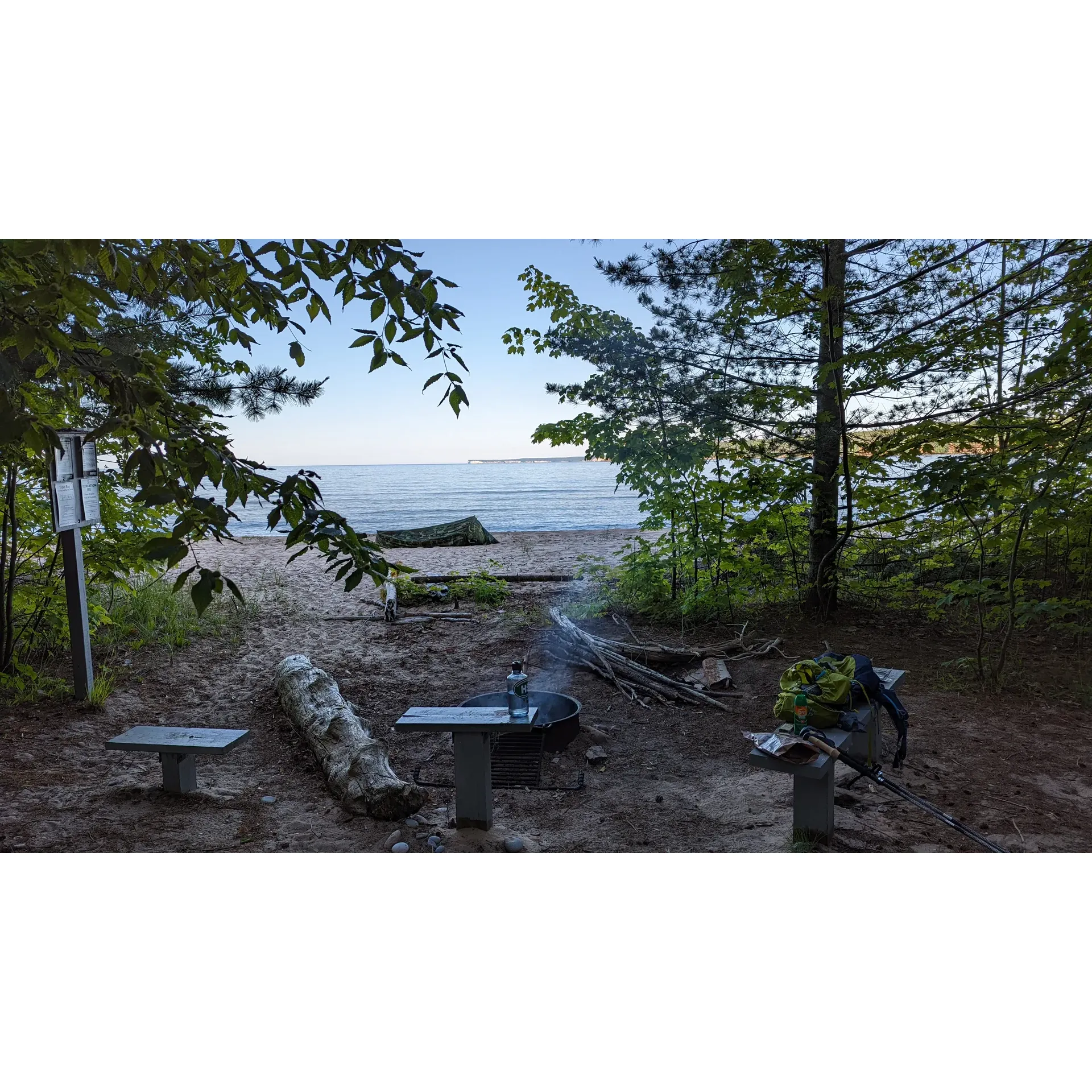 Driftwood Campsite offers a rare chance to relax on pristine beachfront where the sounds of the waves create a serene soundtrack to an unforgettable outdoor experience. Here, guests can set up their tents mere steps from the shore, with the convenience of a built-in fire pit and grill accompanying each camping spot, complete with comfortable seating arrangements to enhance the outdoor living experience.

At this premier destination, the natural beauty of the surroundings is showcased in spectacular fashion, with opportunities to witness breathtaking sunrises illuminating the sky in a symphony of colors. Mornings at Driftwood Campsite are moments of pure tranquility as daylight reveals the stunning landscape.

This idyllic retreat is celebrated for its picturesque setting and thoughtfully appointed amenities, ensuring that each camper's stay is comfortable, while still maintaining the charm of a primitive campsite. Whether it's the soothing ambiance, the beautiful vistas, or the quality of the facilities, Driftwood Campsite is an incredible choice for both newcomers and seasoned outdoors enthusiasts looking for a superior beachside camping adventure. Description by ChatGPT.