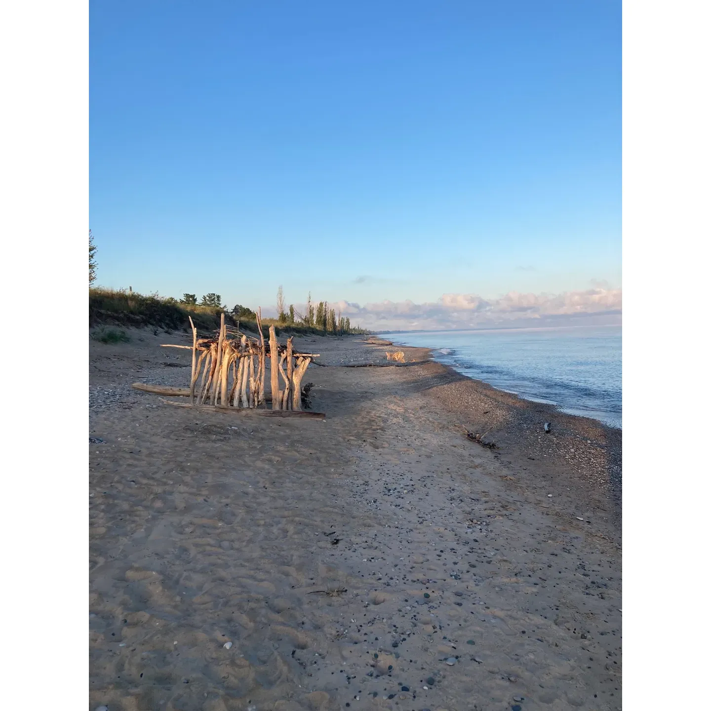 Dunes Area 1 in Pinery Provincial Park is a prime destination for outdoor enthusiasts and families seeking a serene escape in a picturesque setting. Renowned for its tranquility, cleanliness, and remarkable beachfront, this camping locale is a favorite for visitors looking for both relaxation and adventure by the sandy shores.

Guests often rave about the exceptional service provided by the staff, who are ready and willing to assist, ensuring a comfortable and hassle-free stay. With its close proximity to the beach, campers can easily transition from their cozy sites to the soothing sounds of lapping waves for a day filled with sun, sand, and surf.

Those looking for modern comforts will appreciate the availability of electric sites, ensuring that essentials and conveniences are at the ready. Additionally, inclusivity is a cornerstone of the Dunes Area 1 experience, with accessible showers and washrooms catering to a diverse range of needs, and some even include laundry facilities to cater to longer stays.

The unique atmosphere of Dunes Area 1 takes a mystical turn as dusk falls, with the natural surroundings offering an almost ethereal experience under the stars. Visitors often describe the nighttime environment as both 'cool' and 'freaky', making it an exciting recommendation for those who appreciate the nocturnal side of nature.

For over three decades, loyal patrons have chosen Dundry Area 1 as a treasured spot for its riverside views and for cultivating lasting memories. As a testament to its enduring charm, many visitors find themselves returning year after year to indulge in the beauty and serenity of the Dunes. Whether it's lounging beside the river, enjoying the great outdoors, or simply basking in the peace of this idyllic setting, the Dunes Area 1 offers an exceptional retreat within the beloved expanse of Pinery Provincial Park. Description by ChatGPT.