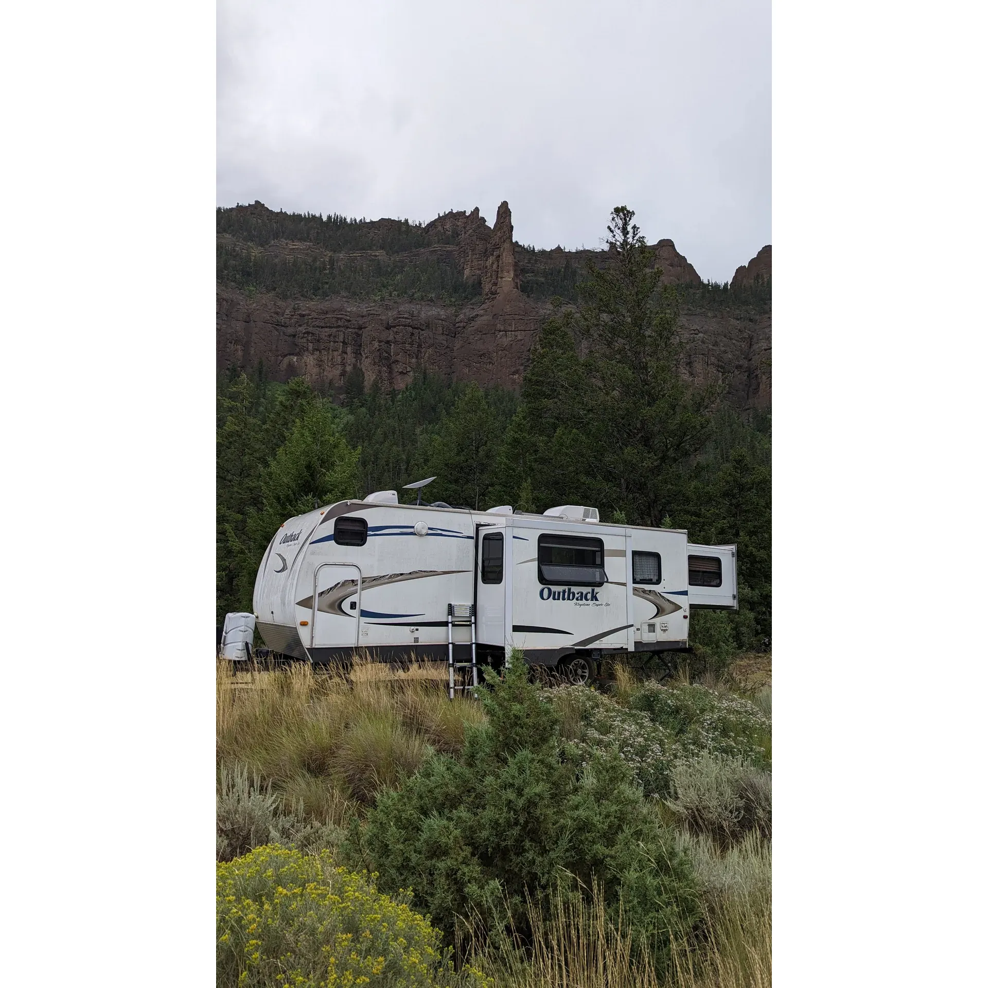 Discover the serene beauty of the great outdoors at Rex Hale Campground, a picturesque retreat perfect for adventurers and nature lovers alike. Ideally situated on the route to the breathtaking Yellowstone National Park and in proximity to a tranquil river, this campground offers a harmonious experience for all its visitors. The sites are spaciously laid out, allowing for plenty of room whether you come equipped with tents or larger RVs.

A source of pride for the campground, every campsite is thoughtfully surrounded by lush trees, providing an intimate setting and a sense of seclusion amidst the wilderness. The immaculate bathrooms receive consistent praise for their cleanliness, ensuring a comfortable and hygienic stay for all.

For photographers and stargazers, the campground's location away from urban light pollution gifts you with a celestial theater of star-studded skies, perfect for capturing awe-inspiring images or simply admiring the universe's natural splendor. Practical amenities such as bear-resistant food storage containers, fire pits, and picnic tables add to the convenience of your stay, prioritizing both safety and comfort.

Enjoy the crystal-clear water and dependable power supply at your site, seamlessly blending the rustic camping experience with modern necessities. Experience genuine hospitality from the friendly camp host, who contributes to the welcoming atmosphere and ensures your stay is both pleasant and memorable.

With majestic views of surrounding cliffs and an idyllic riverside setting, Rex Hale Campground is a hidden gem that provides a peaceful backdrop for a relaxing escape or an active outdoor adventure, just a stone's throw away from the wonders of Yellowstone. Whether visiting in a fifth wheel or a cozy tent, guests can revel in the spaciousness and scenic beauty that make this campground a favorite for travelers on a journey through Wyoming's majestic landscapes. Description by ChatGPT.