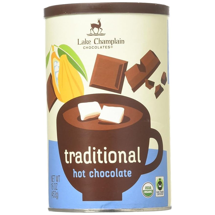 The Lake Champlain Chocolates Traditional Hot Chocolate is a rich and creamy drink mix made with premium cocoa powder and a touch of sugar for sweetness. This 16 oz canister contains enough mix to make approximately 8 servings of hot chocolate, perfect for enjoying as a cozy treat on a cold day or as a special dessert after a meal.