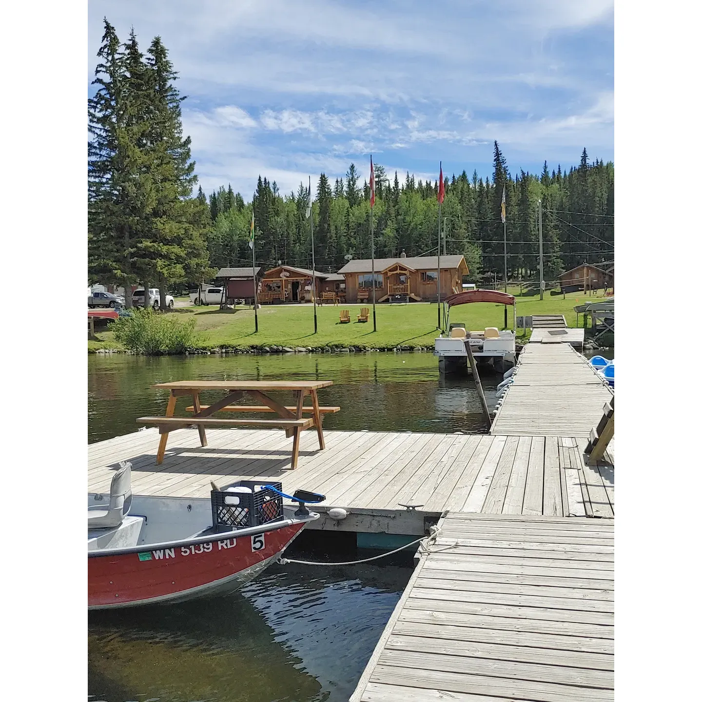 Cariboo Bonanza Resort emerges as a cherished getaway where tranquility meets adventure amidst the spectacular canvas of nature. It presents an inviting atmosphere for travelers seeking a serene sojourn or an engaging outdoor experience. The expansive resort offers various accommodation options, including rustic yet charming cabins and well-maintained campsites, ensuring there is something for everyone.

Set against the mesmerizing backdrop of a star-laden sky on a clear night, the sight is nothing short of spectacular at Cariboo Bonanza Resort. Be it a spontaneous visit or a planned retreat, guests are welcomed with warmth and the freedom to select their ideal spot to unwind. The family-oriented ambiance of the resort is accentuated by the incredibly amiable hosts who are always ready for a friendly chat. This convivial atmosphere extends to the resort’s community, with regular guests adding to the charm and engagement of the environment.

Families find a delightful playground that ignites the joy of younger guests, complete with a small zip line that provides thrills for kids and peace of mind for parents due to the resort's commitment to safety and fun. Those who cherish the great outdoors will find fishing here an absolute pleasure, with the pristine lake serving as the perfect setting for anglers to indulge in their favorite pastime.

Moreover, the Cariboo Bonanza Resort goes beyond expectations to ensure guest satisfaction. With meticulous maintenance across the property, visitors are sure to appreciate the immaculate facilities ranging from the washrooms to the laundry room, reflecting the resort’s steadfast dedication to cleanliness and convenience. The grounds are not only spacious but also thoughtfully landscaped to allow for privacy and a sense of openness.

In addition to clean and cozy lodging, the resort is a treasure trove of amenities and activities, offering guests an array of complimentary games, a communal firepit, and a stimulating environment teeming with local wildlife. Swimming in the glistening waters of the lake and watching the sun dip below the horizon offer a tranquil closure to any eventful day.

Distinguished as a family-friendly sanctuary, Cariboo Bonanza Resort caters to all, from avid adventurers to those who simply wish to soak up the serene beauty of the Cariboo region. It's a place where memories are made, and many visitors yearn to return, drawn back by the magnetic allure of its natural splendor and the impeccable care afforded by the resort's gracious operators. Description by ChatGPT.