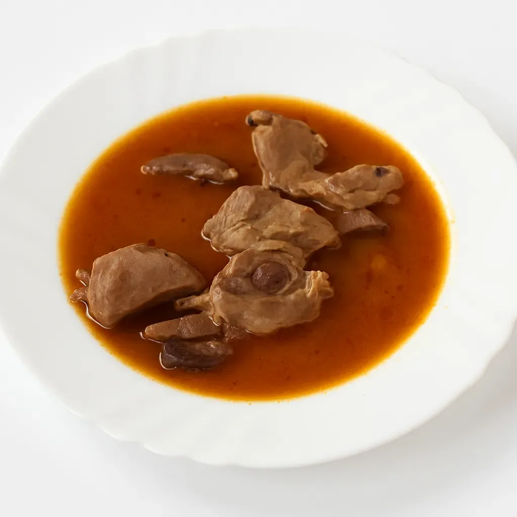 Experience the taste of traditional Albanian cuisine with this Savory Veal Tasqebap. This dish captures the essence of village cooking with tender veal slow-cooked alongside onions, spices, and an abundance of love.