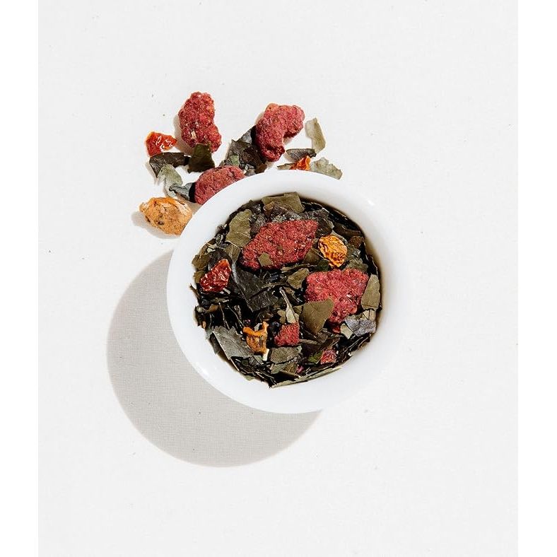 Art of Tea's Happy 2oz is a loose leaf jasmine green tea blend that comes in a convenient tin for easy storage and freshness. This artisanal tea is handcrafted using whole leaf green tea, jasmine flowers, and natural jasmine essence to create a fragrant and delicate brew.