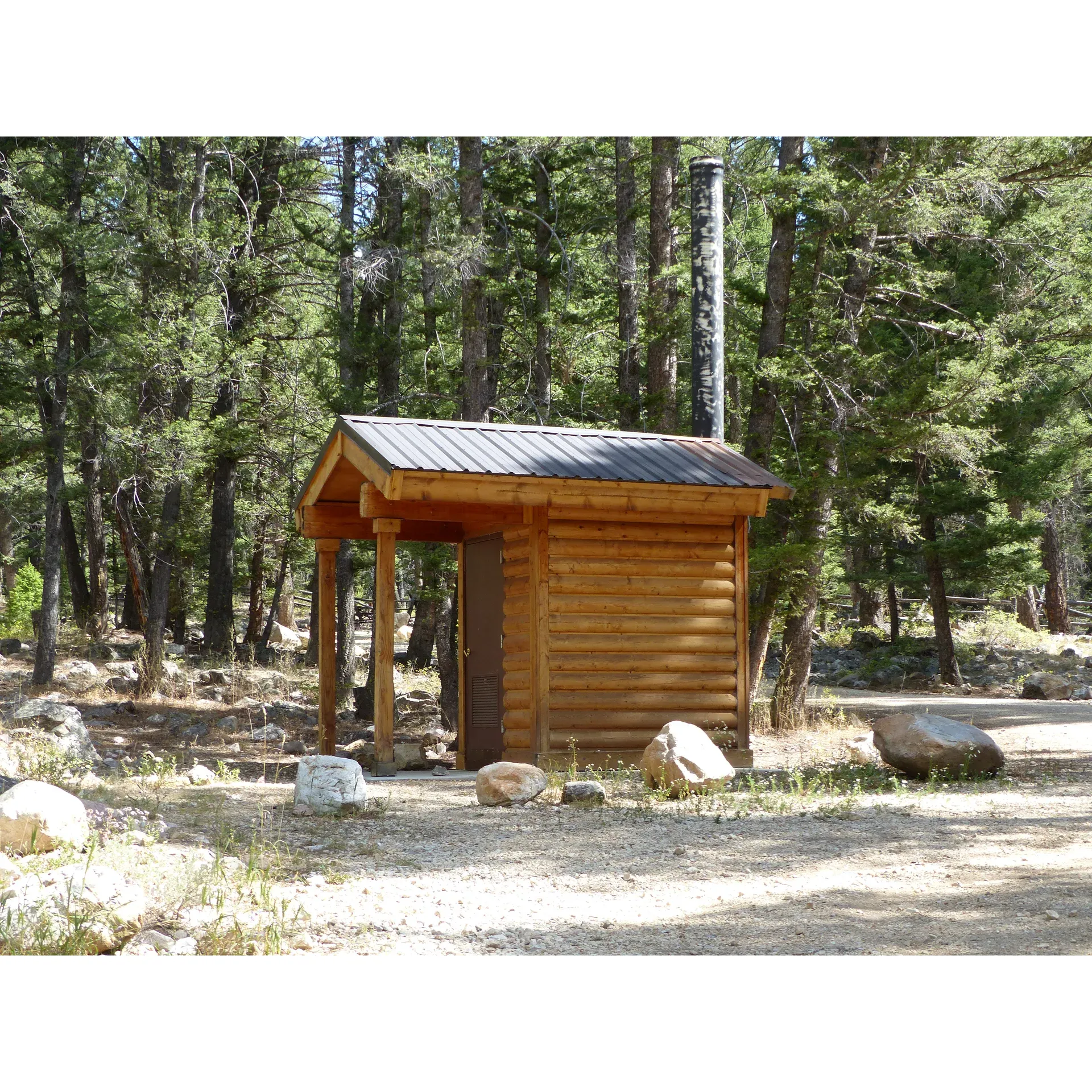 Mill Creek Trailhead & Campground offers a serene and picturesque escape into the great outdoors. Embraced by the natural splendor of its surroundings, the campground presents an idyllic setting for adventurers, families, and nature enthusiasts alike. Visitors consistently rave about the cleanliness of both the camp area and the well-maintained restroom facilities.

A harmonious balance of beauty and tranquility, Mill Creek Trailhead & Campground provides a refreshing lack of crowds, even during peak seasons, ensuring a peaceful and intimate experience. Early-season campers delight in often having the space to themselves, adding to the sense of seclusion and privacy.

For families, the nearby creek is a source of endless joy and exploration. Young children and pets find it an excellent playground, offering fun and entertainment in a safe, natural environment. The creek's gentle sounds contribute to the calm and relaxing atmosphere that pervades the campground.

Adding to the allure, outdoor enthusiasts will appreciate the campground's proximity to Barney Hot Springs, creating the perfect opportunity to soak in the warm, soothing waters after a day spent exploring the trails or enjoying the creek.

The area's accessibility is another highlight, with visitors appreciating the ease of reaching this tranquil destination. Those journeying from urban centers like Idaho Falls will find it a worthy drive, as the scenic route unfolds into a secluded paradise that feels worlds away from the bustle of city life.

For anyone looking for a great place to stay where they can be enveloped in shade, enjoy pristine conditions, and relish the quiet whispers of nature, Mill Creek Trailhead & Campground emerges as a cherished gem awaiting discovery. Description by ChatGPT.