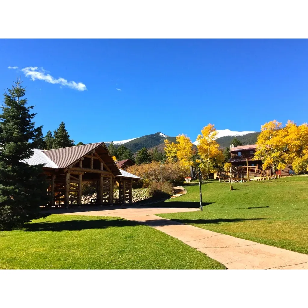 Rainbow Trail Lutheran Camp is a beloved haven that has been impacting lives and fostering communities for generations. This camp is an idyllic destination for children and adults alike, located amidst the breathtaking scenery of the Sangre de Cristo mountains with panoramic vistas that inspire and rejuvenate the spirit.

With a reputation that spans decades, Rainbow Trail Lutheran Camp has become a cherished tradition for many families. Generations have been returning to relive and create new memories, a testament to the camp's enduring charm and the meaningful experiences it offers. Parents take pride in watching their children evolve into mature, responsible leaders through the rich leadership opportunities and nurturing environment provided by the camp.

The local community of Westcliffe and visitors alike speak highly of the welcoming atmosphere at Rainbow Trail Lutheran Camp. Through events like the heartwarming Thanksgiving dinners, guests are greeted by the warmth and dedication of an all-volunteer staff, who exemplify the camp's commitment to hospitality and service. Such gatherings offer a splendid taste of community spirit and the chance to engage with individuals from diverse backgrounds.

Families treasure the sense of security and comfort the camp provides, as it is considered by many to be a 'second home' where safety and happiness are paramount. The well-trained, caring staff have contributed to a sanctuary where everyone can feel protected and free to explore personal growth.

Former campers who fondly call this place their 'Disney World' recount a childhood enriched by the magic of Rainbow Trail Lutheran Camp, filled with meaningful connections and outdoor adventures. Many are overjoyed to find that the camp's beauty and essence have remained just as captivating as they remember. 

It's not simply a camp; Rainbo Trail Lutheran Camp represents a community hub, a natural escape, and a catalyst for lifelong friendships, smooth pathways toward personal development, and the joy of experiencing something profoundly special. Whether for a summer adventure as a child, a stint on staff, or a visit as a part of the local community, Rainbow Trail Lutheran Camp holds a special place in the hearts of all who have walked its paths. Description by ChatGPT.