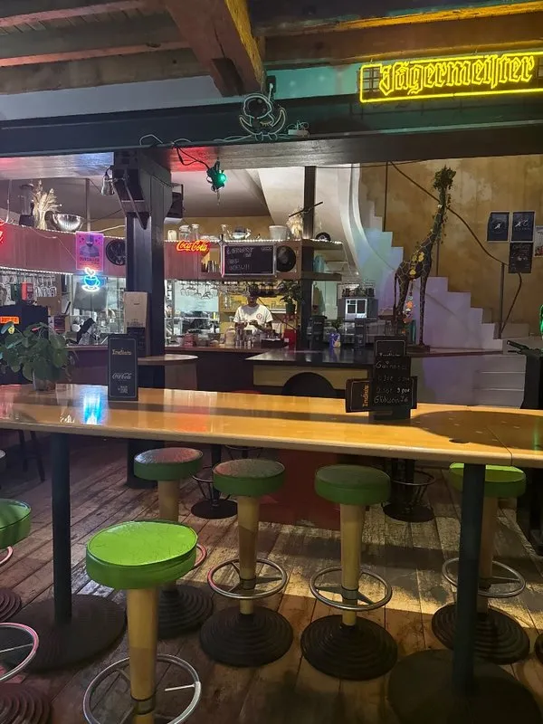 Culinary offerings are a highlight, with a diverse menu that satisfies all dietary preferences, including mouth-watering vegan options. Patrons rave about the well-paired selection of local wines, refreshing draft beers, and expertly crafted cocktails. The café's convenient location offers easy access to free public transportation and is just a short stroll from the city center, making it a perfect stop for both locals and visitors.