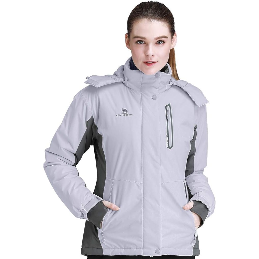 The CAMEL CROWN Women’s Mountain Snow Waterproof Ski Jacket is a versatile and functional winter coat designed for outdoor activities in harsh weather conditions. This jacket is made with a durable waterproof and windproof material to keep you dry and warm in snowy or rainy conditions.