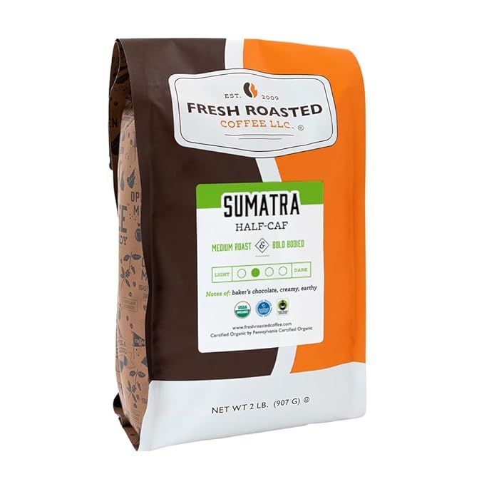 This 100% Organic Sumatra Water Half-Caf coffee is a medium roast blend that is both Rainforest Alliance (RFA) certified and Kosher. It comes in a 2 lb (32 oz) package of whole beans, ensuring freshness and flavor preservation until the moment you grind them for brewing.