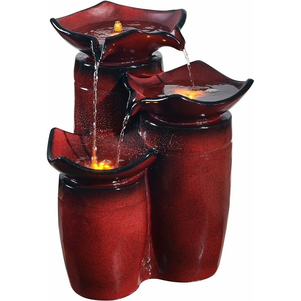 The Teamson Home 3 Tiered Floor Water Glazed Pots Fountain is a stylish and elegant addition to any outdoor space. Standing at 20 inches in height, this fountain features three tiers of gradient red glazed pots that cascade water down into the lower levels, creating a soothing and tranquil atmosphere.