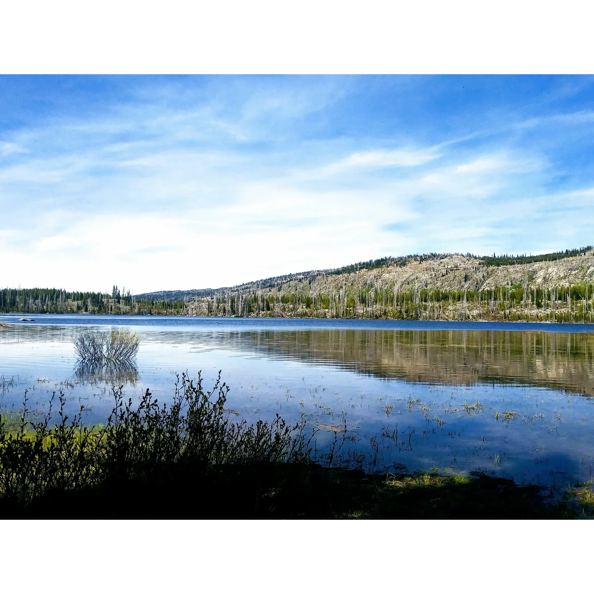 Hazard Campground offers a serene escape into the heart of nature's beauty, presenting visitors with a truly tranquil experience. The journey itself, though on a rugged dirt road, hints at the untouched charm awaiting guests who are advised to take it slow to safely reach their destination. Once there, they are greeted with a picturesque landscape that ranks among the most beautiful settings for outdoor enthusiasts.

Renowned for its appeal, the campground boasts good availability for both tent and trailer sites, ensuring a hospitable stay for various types of campers. Guests are encouraged to embrace the self-sufficient ethos of the camp, carrying in their essentials and leaving no trace, thus preserving the pristine condition of the surrounding environment. The provided pit toilets are well-maintained, adding convenience without detracting from the rustic ambiance.

While the region has a history of natural change, with a fire decades past altering the landscape, it has recovered to become a unique setting with its own charming vistas. Hikers and off-highway vehicle aficionados can find solace and adventure on the many trails that wend through the area, promising exploration and discovery beyond the campgrounds.

Fishing enthusiasts will be delighted by the angling prospects, celebrating the catch of the local species like the colorful Brook trout. The thoughtful maintenance of camping spots ensures that every visitor has a comfortable and accommodating space to settle into. The presence of a friendly and helpful camp host enhances the experience, while accessible spring water from the pump contributes an appreciated touch of wilderness convenience.

Evenings at Hazard Campground are graced by stunning sunsets that paint the tranquil lake in vivid hues, crafting an atmosphere perfect for relaxation and contemplation. Guests are reminded that the open landscape, while majestic in its expansiveness, carries sound, making this destination ideal for those seeking solidarity with both nature and the vibrant community of fellow campers. The constant buzz of 4-wheelers and razors is a testament to the lively spirit that thrives here, perfect for visitors with a passion for recreational vehicles and the shared joy of the great outdoors.

Ultimately, Hazard Campground calls to those yearning for a getaway that combines tranquility with a touch of adventure, promising return trips and long-lasting memories. Description by ChatGPT.