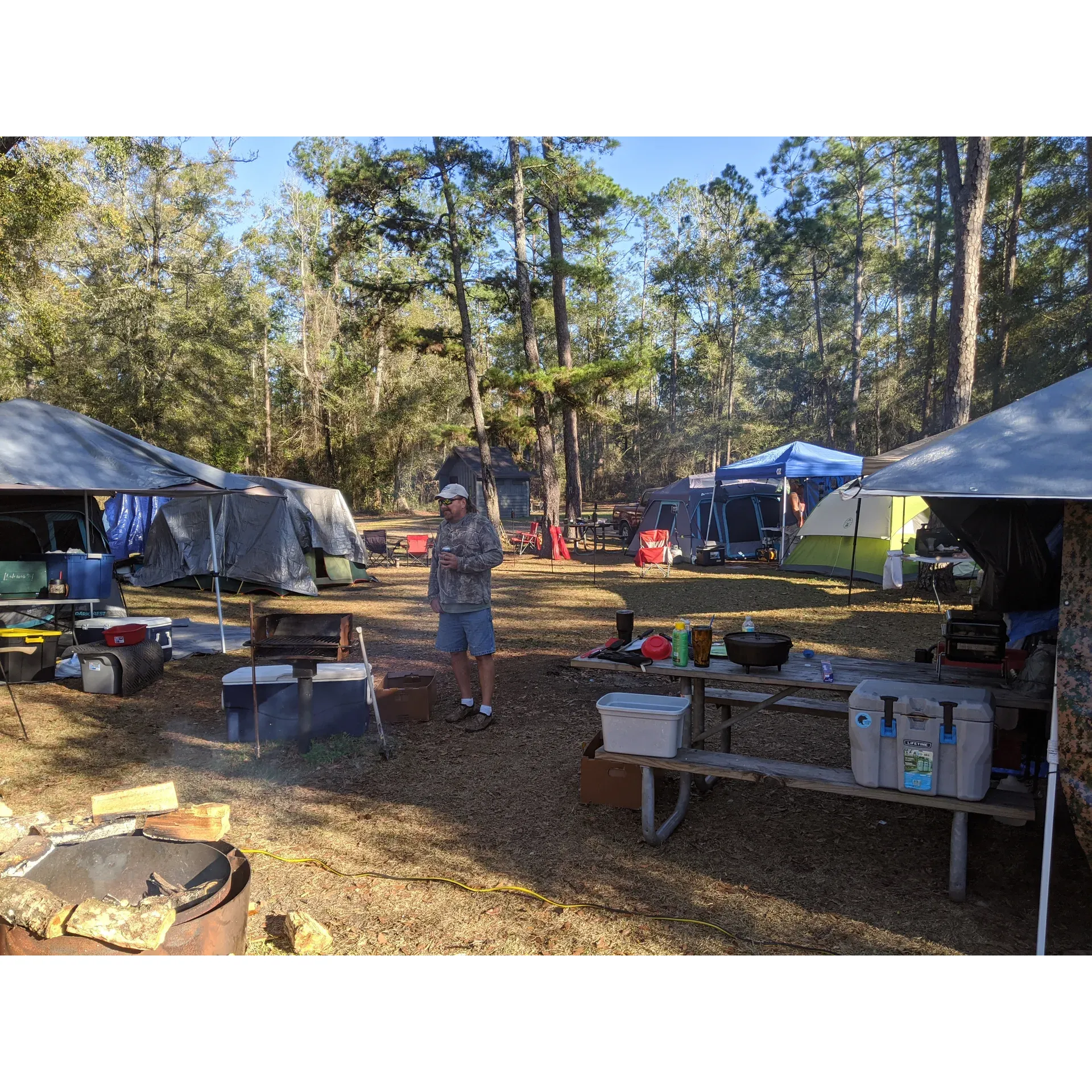 Mack Landing Campground offers an idyllic retreat within the expansive and serene Apalachicola National Forest in the Florida Panhandle. This peaceful hideaway is the ideal destination for outdoor enthusiasts looking for authentic camping experiences. With its lush forest setting, the campground delivers ample opportunities to unwind beside the tranquil waters of the Ochlocknee River.

As a first-come-first-serve campground, Mack Landing provides an intimate selection of well-maintained sites, ensuring a sense of privacy and a close-knit community atmosphere. The courteous camp host on-site enhances the camping experience with a warm welcome and assistance when needed. Each campsite is equipped with picnic tables and fire rings, inviting campers to enjoy meals outdoors and cozy evenings by the fire under the canopy of majestic trees.

The clear, cool waters of the river beckon visitors to explore by boat, with convenient ramp access available for an array of water-based activities. Adventure-seekers can immerse themselves in nature on one of the few trails surrounding the campground, discovering the unique flora and fauna of the region.

Affordability is a key feature at Mack Landing, with fees that encourage longer stays to fully embrace the camping lifestyle. While the campground embraces simplicity and encourages disconnecting from the hustle of daily life—providing well water and eco-friendly composting toilets—it also accommodates larger RVs, ensuring that all types of campers can enjoy this hidden gem.

Mack Landing Campground captures the essence of unspoiled camping. Its secluded location lets you savor the sounds of nature, the gentle rustling of leaves, and the lapping of river water on the shores, making for an unforgettable retreat to nature where everyday worries fade into the background. Description by ChatGPT.