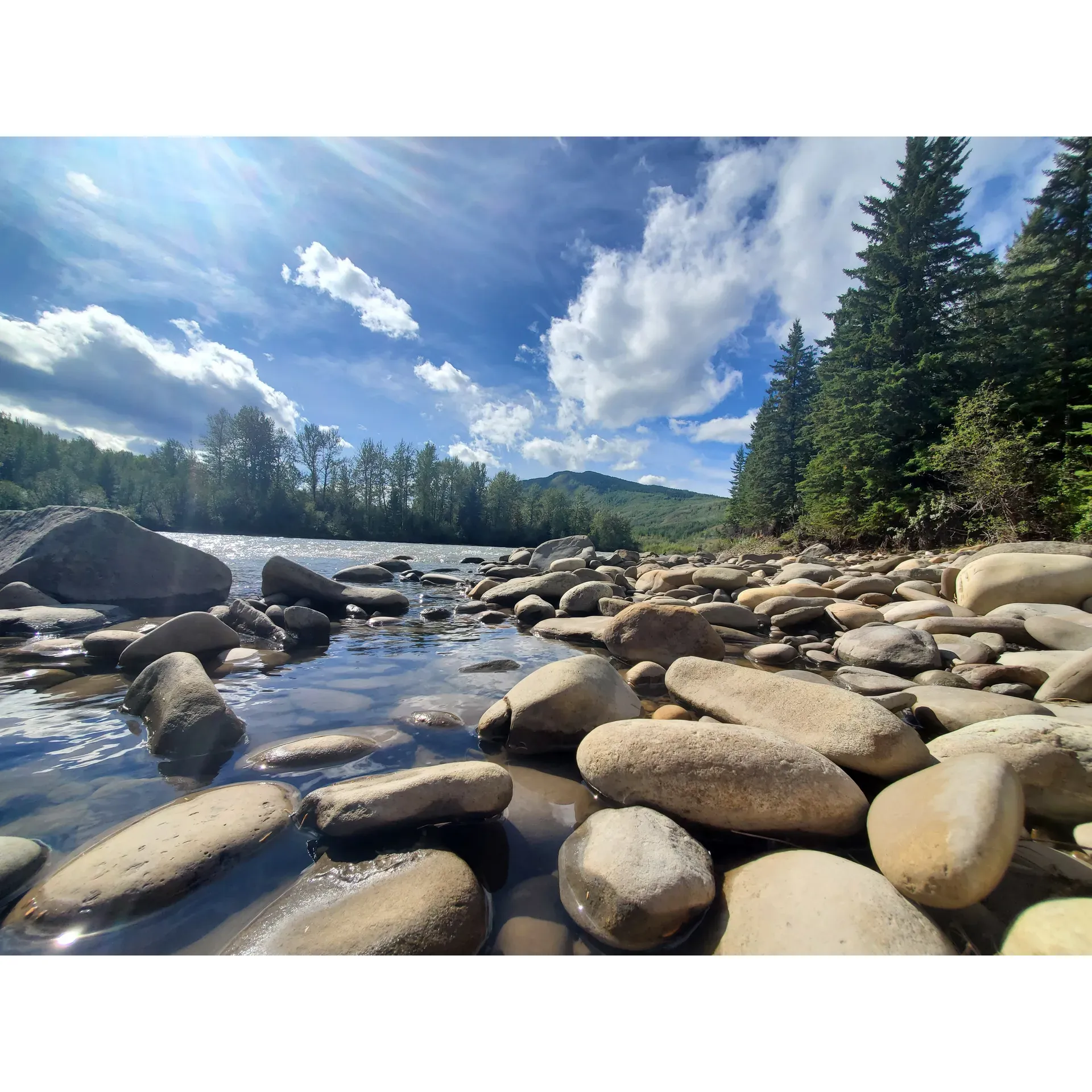 Sheep Creek Provincial Recreation Area is a serene and picturesque destination for outdoor enthusiasts and nature lovers. Embracing the tranquil shorelines of the Smoky River, the area offers an idyllic retreat with many of its campsites backing directly onto the soothing sounds and views of the flowing water. Visitors are treated to an authentic and peaceful camping experience on a first-come, first-served basis, with the chance to find themselves enjoying the exclusivity of the landscape, especially outside of peak seasons.

The magnificence of the great outdoors unveils itself in the clear, crisp air and the visually-striking scenery that envelops the campground. Great care is taken to maintain the grounds, making every stay comfortable and enjoyable. The provision of firewood adds a welcome touch, encouraging evenings spent under the stars around a cozy campfire, all at an affordable rate of $20 a night.

Ideal for a weekend getaway, Sheep Creek Provincial Recreation Area provides basic amenities including a bathroom, catering to the needs of campers while maintaining a rustic charm. Although there are no hookups, the simplicity of the setup is perfect for those seeking to disconnect from life's hustle and immerse themselves in the tranquility of nature. Located approximately 30 minutes from Grande Cache, it offers easy access while still feeling like a secluded paradise.

Families visiting with children and dogs will find the area enchanting and safe for walks, exploration, and cherished time spent together. Whether seeking solitude or an adventurous family outing, Sheep Creek Provincial Recreation Area presents a haven of natural splendor that beckons a return visit. Description by ChatGPT.