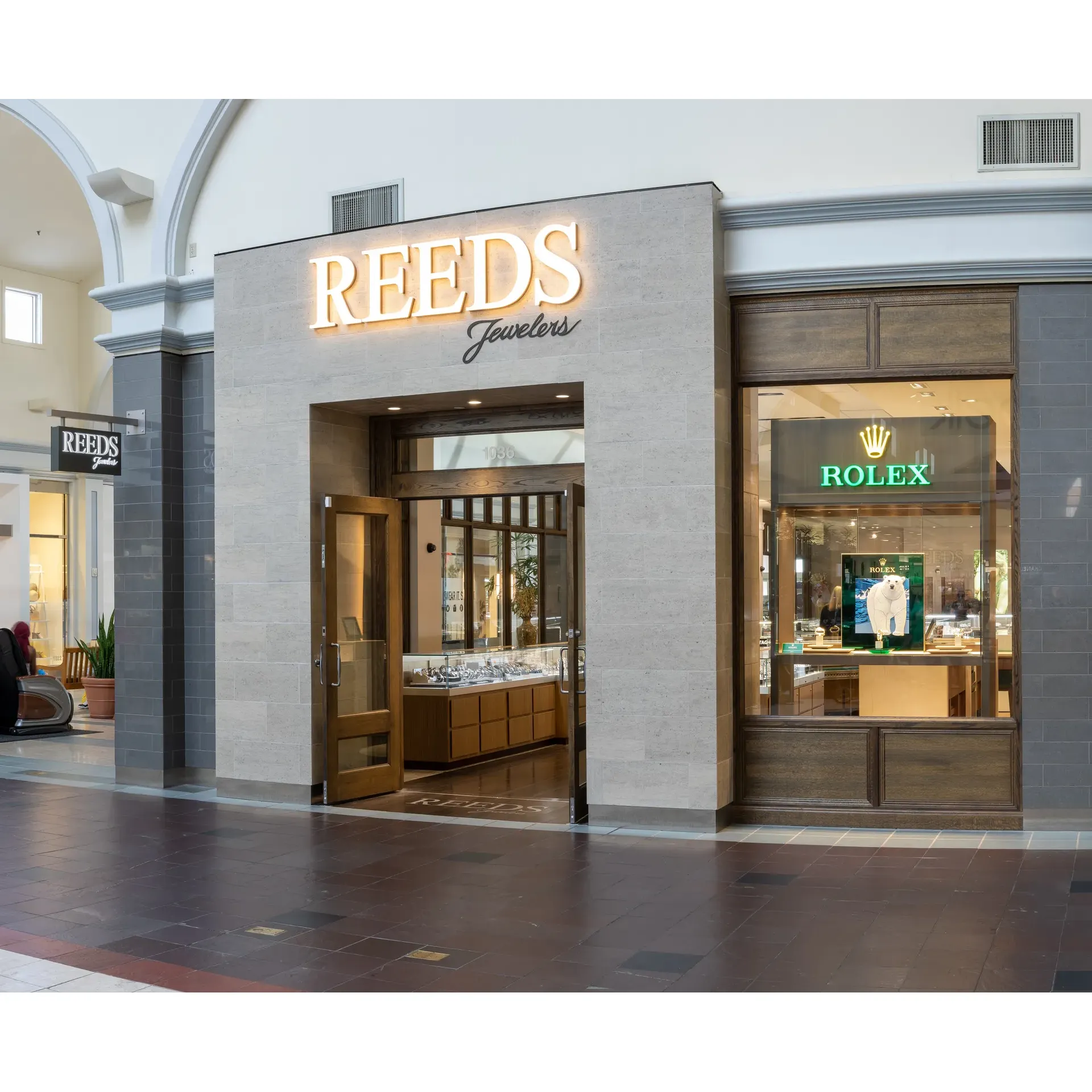 REEDS Jewelers emerges as a treasured destination for those seeking exceptional jewelry and unmatched customer care. An epitome of value and service, REEDS draws patrons from afar, from the Northeast's charming Connecticut to the sun-kissed shores of South Carolina, all converging where service meets sincerity and expertise with Bryan K. at the helm. His transparent advice and dedication to securing the utmost value have enchanted many, resulting in perfectly upgraded engagement rings chosen without a hint of undue influence, simply pure satisfaction.

Beyond the sparkle of gems, it's the luminous warmth of the staff that adds to the REEDS experience. The team, described as indefinitely affable, ensures that each visit, each query, is met with a touch of personal kindness and professional insight. Their approach makes luxury accessible, with a wide array of products that cater to any budget. Moreover, flexible financing options are tendered with a keen sense of customer respect, ensuring dream purchases never become financial burdens.

The intimate journeys of life are honored here, as Jody and Joey demonstrate by guiding couples through the milestones of engagement and marriage. Their commitment to respect budgetary restraints while providing an array of choices signifies a deep understanding of individual needs. The extra mile is never too far, with complimentary cleaning services adding to the lasting impression.

And then there's Bryan – a jeweler who battles on behalf of his clients, seizing every promotional and discount opportunity to craft a seamless and satisfying engagement ring buying experience. His candid accessibility, even outside traditional hours, reflects the devotion that REEDS is known for.

Over a decade, loyal customers return, not just for the allure of finely crafted timepieces or the broad knowledge that Bryan shares but because of the genuine and heartfelt rapport they reserve for every visitor. This integrity in service and passion for ensuring love for each purchase before profit mark the exceptional journey at REEDS Jewelers – a place where the relationship is as enduring as the jewelry it houses. Whether state lines are crossed or phone lines are dialed, REEDS remains the jeweler of choice, a beacon of hospitality in the world of fine jewelry. Description by ChatGPT.