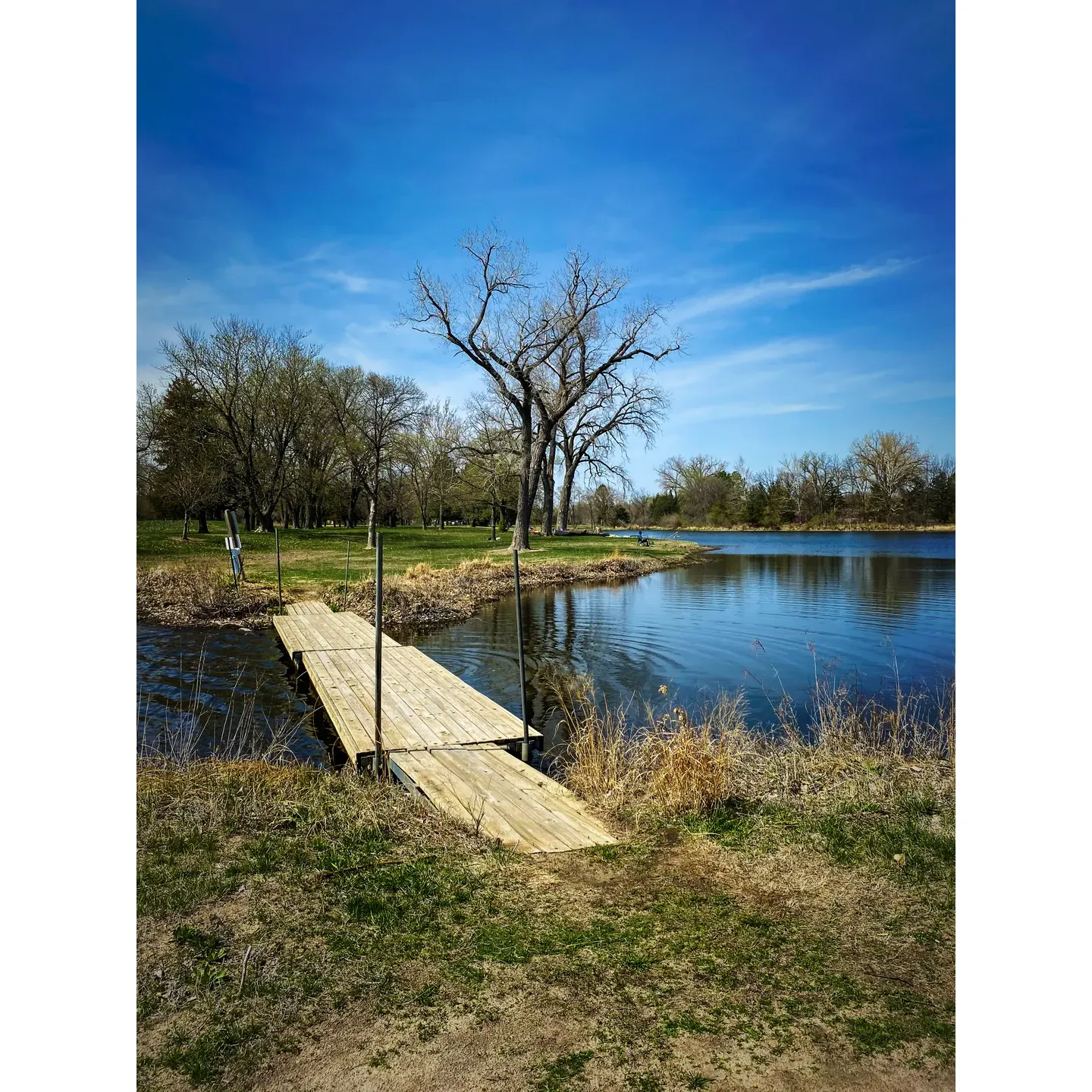 Two Rivers State Recreation Area offers a serene escape for outdoor enthusiasts and families alike. Just a short drive from Omaha, this charming recreation spot is an angler's paradise with its abundant fishing opportunities in both the tranquil lakes and the flowing Platte River. The well-maintained facilities, including newly upgraded dump stations and freshwater provisions, ensure a comfortable and convenient stay for visitors.

The park provides a variety of water-based activities such as canoeing and swimming in its picturesque lake, while those looking to stay on land can enjoy old-fashioned playgrounds, along with hiking and biking trails that meander through the lush environment. It's an ideal destination for parents to introduce their children to the joys of fishing, surrounded by the area's natural beauty.

Day-trippers from Omaha can find solace in the simple pleasures of a picnic followed by a leisurely hike around the lake or through the wooded areas, where every season paints a different picture, from verdant summers to the understated beauty of winter's foliage. The park accommodates campers of all preferences with ample campsites catered to different trailer sizes and outdoor adventurers.

For a unique camping experience, guests can reserve one of the distinctive caboose camper cabins, adding a memorable twist to their stay. While the park may not boast a complex network of marked trails, it compensates with its family-friendly camping offerings and the chance to immerse oneself in nature's playground. Swimming options are plentiful, with both a small lake beach and river access, though the lake provides a more controlled environment for families.

Cleanliness and safety are hallmarks of Two Rivers State Recreation Area, ensuring peace of mind for parents and a welcoming atmosphere for all who visit. The park's wildlife, including a diverse array of birds and aquatic creatures, is a testament to the rich ecosystem that thrives here, providing endless exploration and discovery opportunities.

The helpful and efficient staff exemplify the park's commitment to visitor satisfaction, offering advice and assistance to ensure a fulfilling outdoor experience. Two Rivers State Recreation Area stands out as a picturesque and family-friendly haven for those who cherish the simplicity and splendor of the great outdoors. Description by ChatGPT.