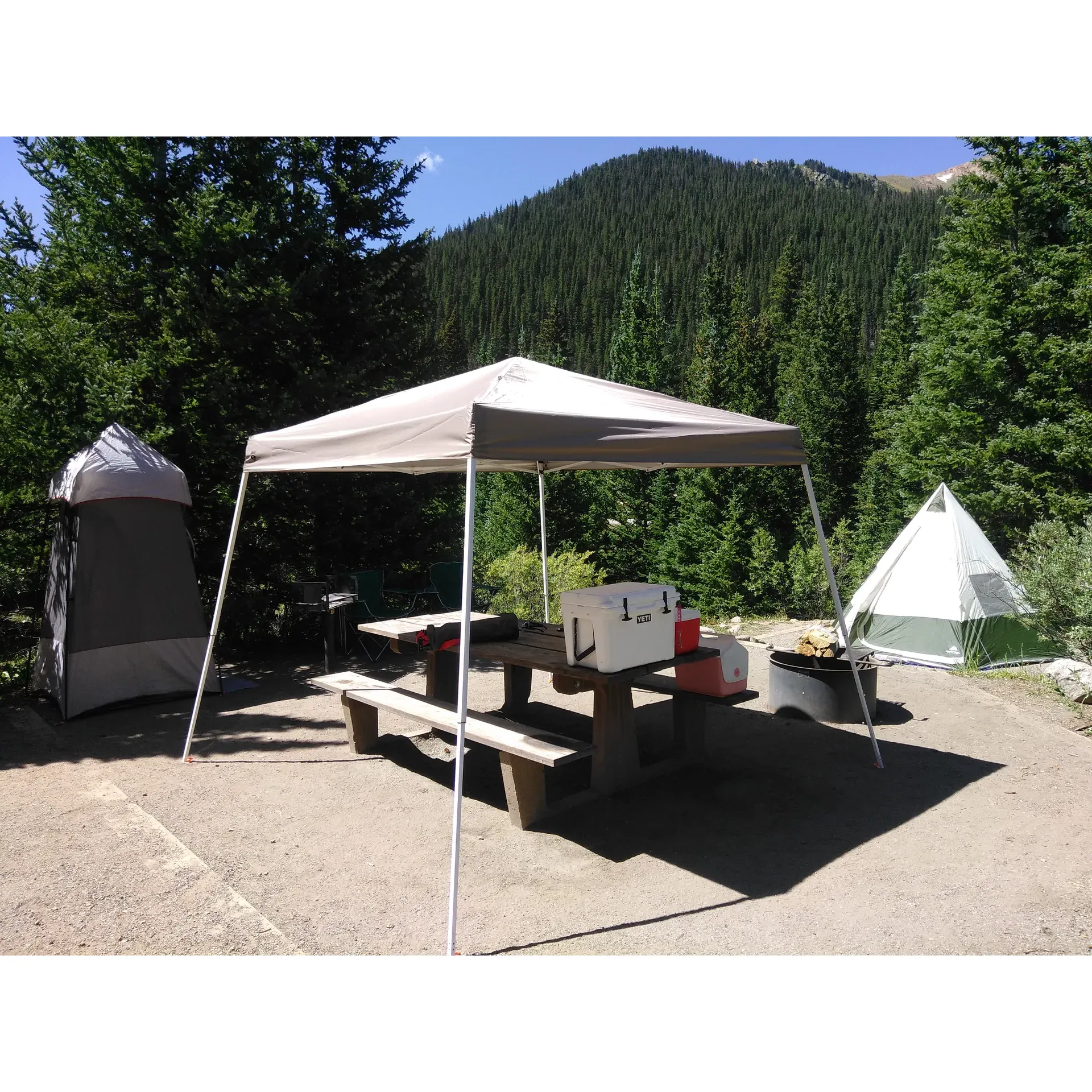 Guanella Pass Campground emerges as a sublime mountain oasis for those seeking an outdoor retreat among nature’s splendor. Located in an area known for its pristine beauty, the campground offers visitors a serene escape with the soothing soundtrack of nearby flowing streams, enhancing the tranquil atmosphere of the great outdoors.

The campsites are lauded for their cleanliness and natural charm. The bathrooms receive high praise for their exceptional upkeep, adding a touch of comfort to the rustic camping experience. With sites set against a picturesque backdrop of woodland and open skies conducive for stargazing, campers can take in the wonders of the nocturnal heavens beside a cozy fire pit.

The camp hosts at Guanella Pass Campground are renowned for their hospitality and resourcefulness, providing guests with invaluable insights for hiking and local sightseeing. Murph, the departing camp director, has left a legacy of friendliness that continues with David, who is celebrated for his amicability and commitment to ensuring a memorable stay.

The campsite terrain varies, with the upper sites offering warmer and drier conditions, ideal for those who prefer a more temperate climate. Even during inclement weather, sites demonstrate resilience against the elements, a testament to the thoughtful site planning and natural terrain of the campground. 

Visitors are often delighted by the unexpected encounters with local wildlife, such as big horn sheep, which add an element of adventure to the experience. Spacious, well-distributed campsites offer a private enclave in the forest, providing ample space for relaxing, family play, and setting up hammocks beside the babbling creeks. For those looking for nearby activities, the campground serves as a perfect base camp for the historical Georgetown Railroad excursion and is located at a convenient distance from the charms of the local town - including ice cream parlors and breweries.

For those who travel with smaller trailers, Guanella Pass Campground is known to be accommodating, with positive remarks about the feasibility of setup and the bonus of a faint cell signal for added connectivity. This campground is celebrated as a meticulously maintained haven for nature lovers and outdoor enthusiasts, promising a retreat that is as invigorating as it is peaceful. Description by ChatGPT.