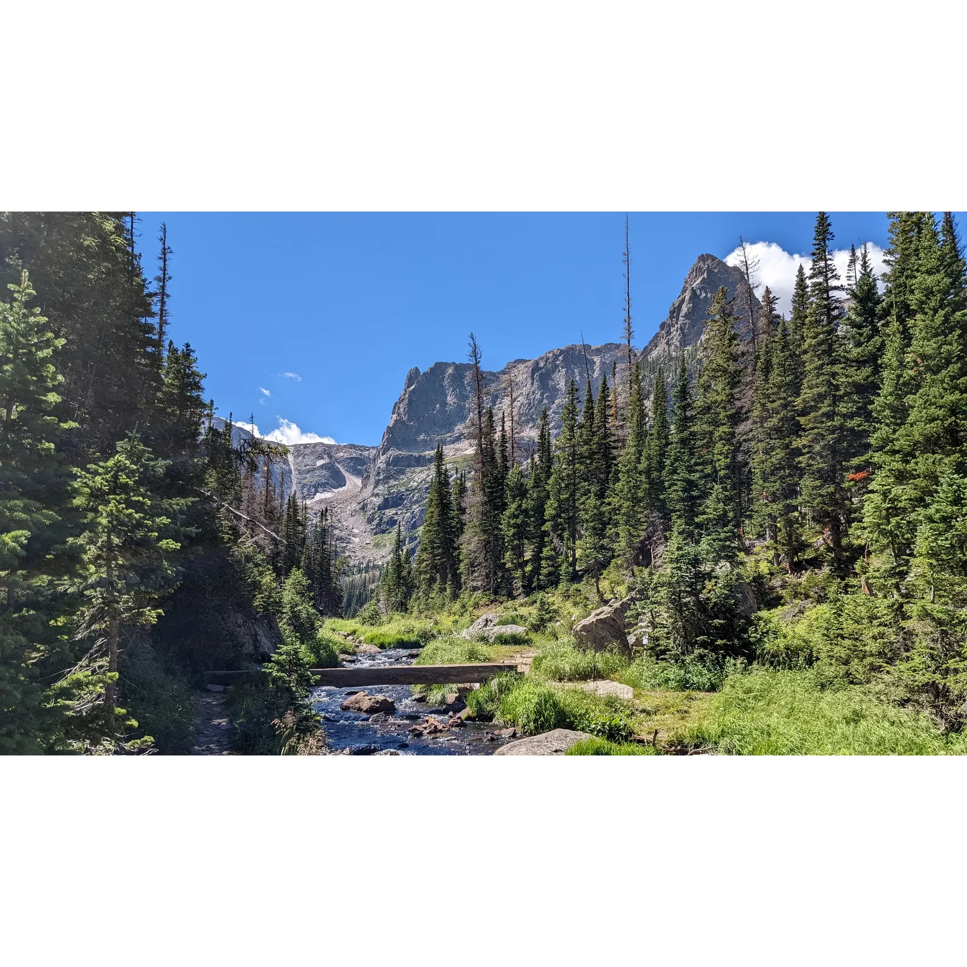 Odessa Lake is an extraordinary destination for outdoor enthusiasts and hikers looking for a rewarding adventure. Embarking on the journey from Fern Lake trailhead, visitors can expect a full-day trek that challenges and invigorates, ascending along steep paths that lead to a stunning natural spectacle. While the route is rigorous, it is also accessible; a decent pair of hiking boots suffices to traverse the well-trodden paths.

For those looking for a slightly less demanding approach, setting off from Bear Lake provides an alternative that makes the scenic rewards more quickly attainable. Whichever path is chosen, the trek to Odessa Lake is characterized by panoramic vistas that captivate and delight.

Upon arrival, the lake presents a feast for the senses, with the surrounding peaks forming a dramatic backdrop. This alpine gem offers an incredible payoff for the efforts exerted, revealing an awe-inspiring landscape that invites peaceful reflection among the high mountain splendor. Visitors frequently remark on the sheer beauty of the hike, punctuated by an orchestra of natural views that make each step worthwhile.

The unparalleled splendor of Odessa Lake provides hikers with an unforgettable experience and incredible photo opportunities in the heart of a pristine wilderness. With its enchanting environment and the promise of exhilaration and tranquility, it is a truly outstanding destination for nature lovers and those seeking to immerse themselves in the majesty of the great outdoors. Description by ChatGPT.