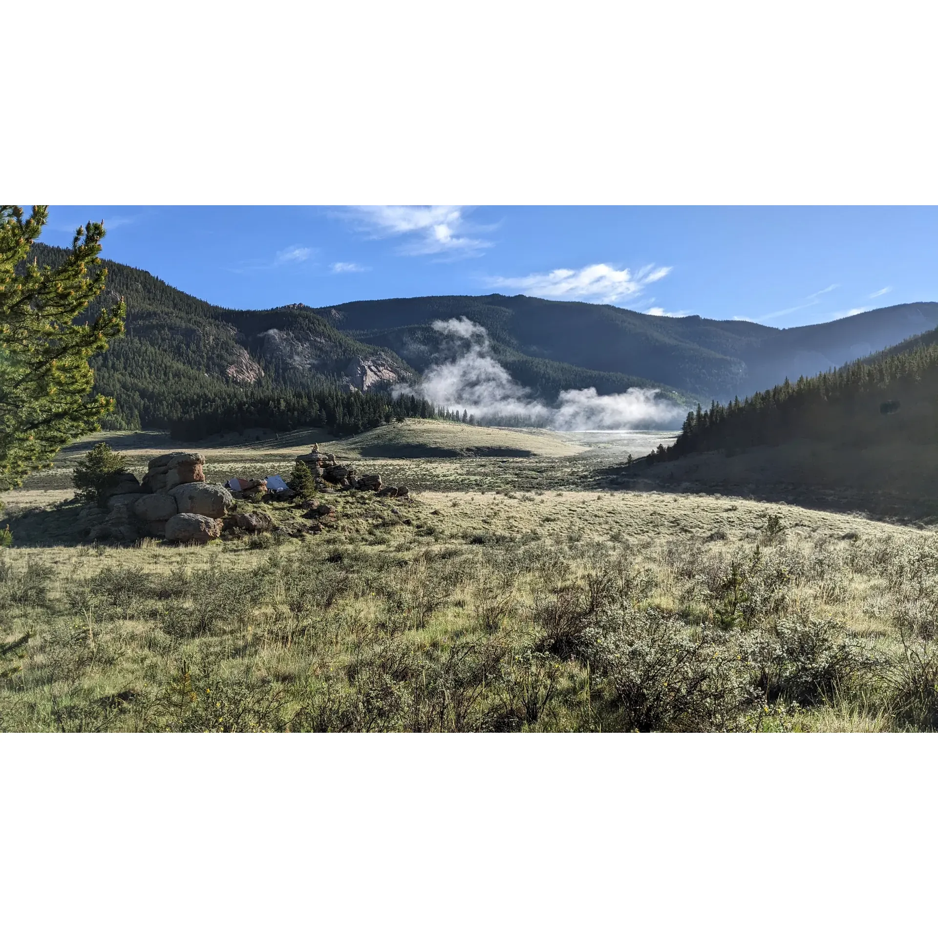 Lost Park Campground offers a serene retreat for outdoor enthusiasts looking to immerse themselves in the beauty of the wilderness. A hidden gem just beyond civilization's hustle, this campground provides a gateway to the breathtaking Colorado trail with three distinct trailhead sections accessible en route to the camp. Visitors are greeted by thoughtfully improved grounds that are complete with picnic tables to enjoy meals amidst nature, fire rings for cozy, crackling campfires under starry skies, and flat areas designated for convenient parking.

This picturesque outdoor paradise boasts stunning views that are even more dramatic on a misty, rainy day—offering a magical ambiance that simply enhances the experience. With an array of trails, hikers of all skill levels can find both tranquility and adventure, whether it's through a leisurely short hike or tackling the more challenging Lost Creek Wilderness loop.

For those seeking solitude and communion with nature, the isolation of this campsite is a perfect backdrop, fostering a deep connection with the environment that beckons repeat visits. Guests venture here to forge lifelong memories, share in the reverence of the sacred land as families have for generations, and even honor loved ones in this profoundly special setting.

Aside from the profound tranquility, the campground is a haven for fishing enthusiasts, with many streams rich in aquatic life. For hikers, there's an endless landscape to explore, with the possibility of discovering hidden treasures such as a locally cherished totem pole.

Visitors are encouraged to come prepared with rain gear and warm clothing to enjoy the pleasantly cool nights and delightful warm days. A well pump at the site provides refreshingly great-tasting water, but guests are reminded to bring their own firewood and practice Leave No Trace principles, ensuring that the pristine beauty of this special place remains intact for future visitors to cherish just as much as those who have found solace here for years. Description by ChatGPT.