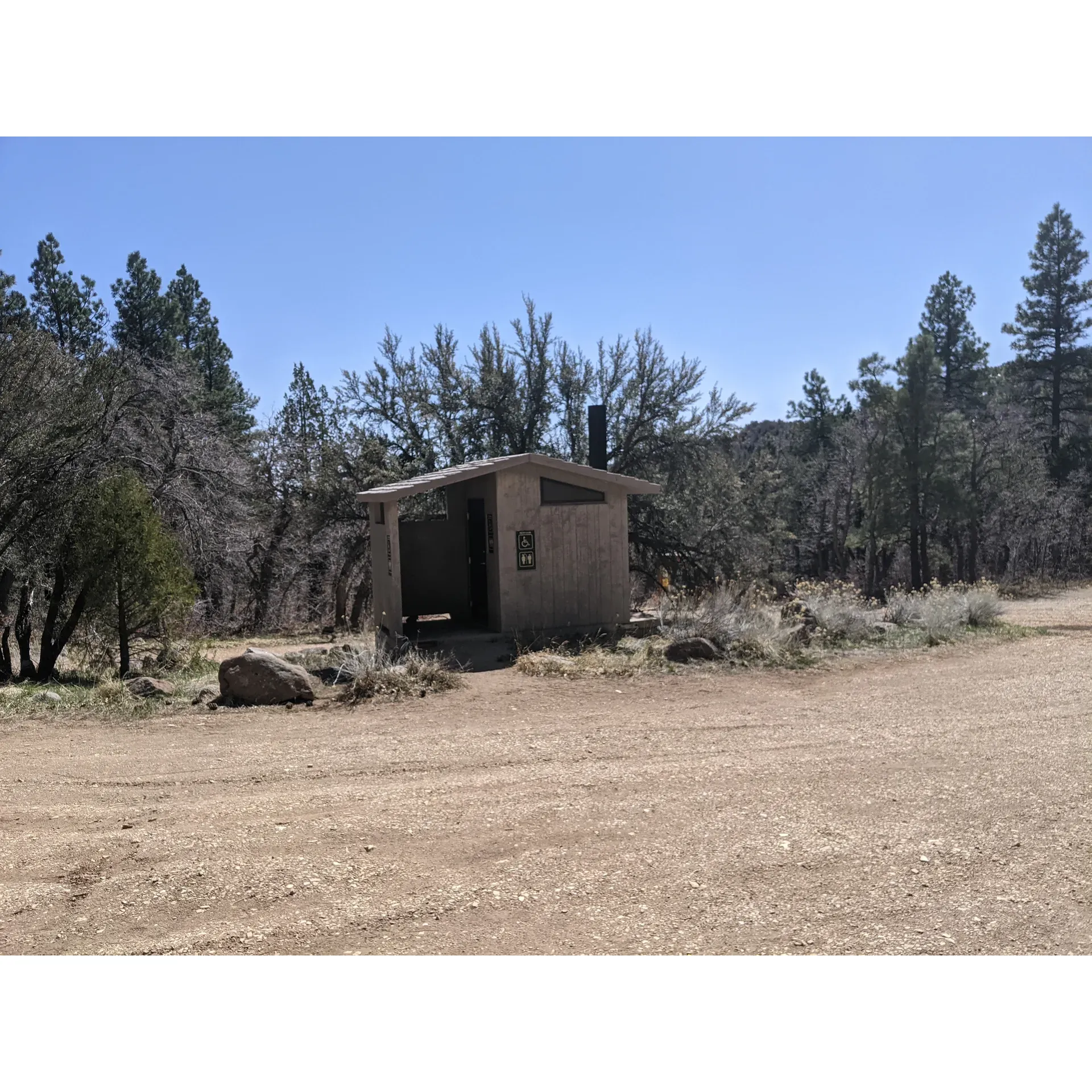 Oak Grove Campground offers an idyllic escape into the serenity and beauty of the great outdoors. Embrace tranquility as you immerse yourself in an environment where the melodious sounds of birds chirping and the gentle flow of water form the perfect backdrop for relaxation. Generously spaced camping spots ensure a sense of privacy and connection with nature, making it an ideal site for those looking to unwind.

Adventure seekers will find their haven here, with short hikes leading to the inviting creeles and the allure of exploring historical abandoned campsites within the lush forest. The campground is a treasure trove of natural wonders, with its ancient pine groves providing a majestic canopy and a habitat that resonates with the harmony of wilderness.

For the more active visitors, Oak Grove Campground is a starting point for trails that boast awe-inspiring views of Signal Peak Ridge and the expansive Hurricane Valley. Hiking enthusiasts can revel in the stunning fall color display each October or enjoy the crisp mountain air and panoramic vistas year-round.

This sanctuary in the wild is also favored for its great expansiveness, allowing ample room for campers to find their perfect spot. The trails accommodate various skill levels, aiming to deliver an exhilarating yet accessible hiking experience culminating in amazing viewpoints.

Visitors frequenting the campground during Memorial weekend or the cooler seasons will find a unique charm, with the peacefulness of the area punctuated by sights of snow-dusted landscapes and the bubbling streams painting a picturesque scene.

Providing basic amenities, such as outhouse-style bathrooms, the campground maintains an authentic outdoor experience. Oak Grove Campground is a gem for those with a love for rustic camping, a passion for exploration, and an appreciation for nature's splendor, all at an incredible value. Whether seeking solitude or an outdoor adventure, Oak Grove Campground is a retreat that truly enriches the soul. Description by ChatGPT.