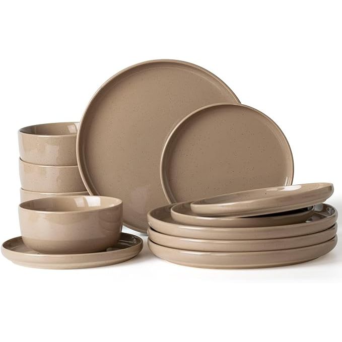 The Famiware Milkyway Plates and Bowls Set is a 12-piece dinnerware set designed to serve 4 people. The set includes 4 dinner plates, 4 salad plates, and 4 bowls, all in a warm and inviting cinnamon brown color. These dishes are made from high-quality stoneware that is durable and dishwasher safe for easy cleaning and long-lasting use.