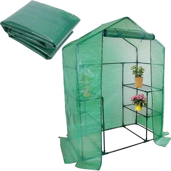 The Walk-in Greenhouse Replacement Cover is a 56 x 29 x 76 inch PE plant gardening greenhouse cover designed for protecting plants from cold, frost, wind, and rain. It comes with a roll-up zipper door for easy access and ventilation.
