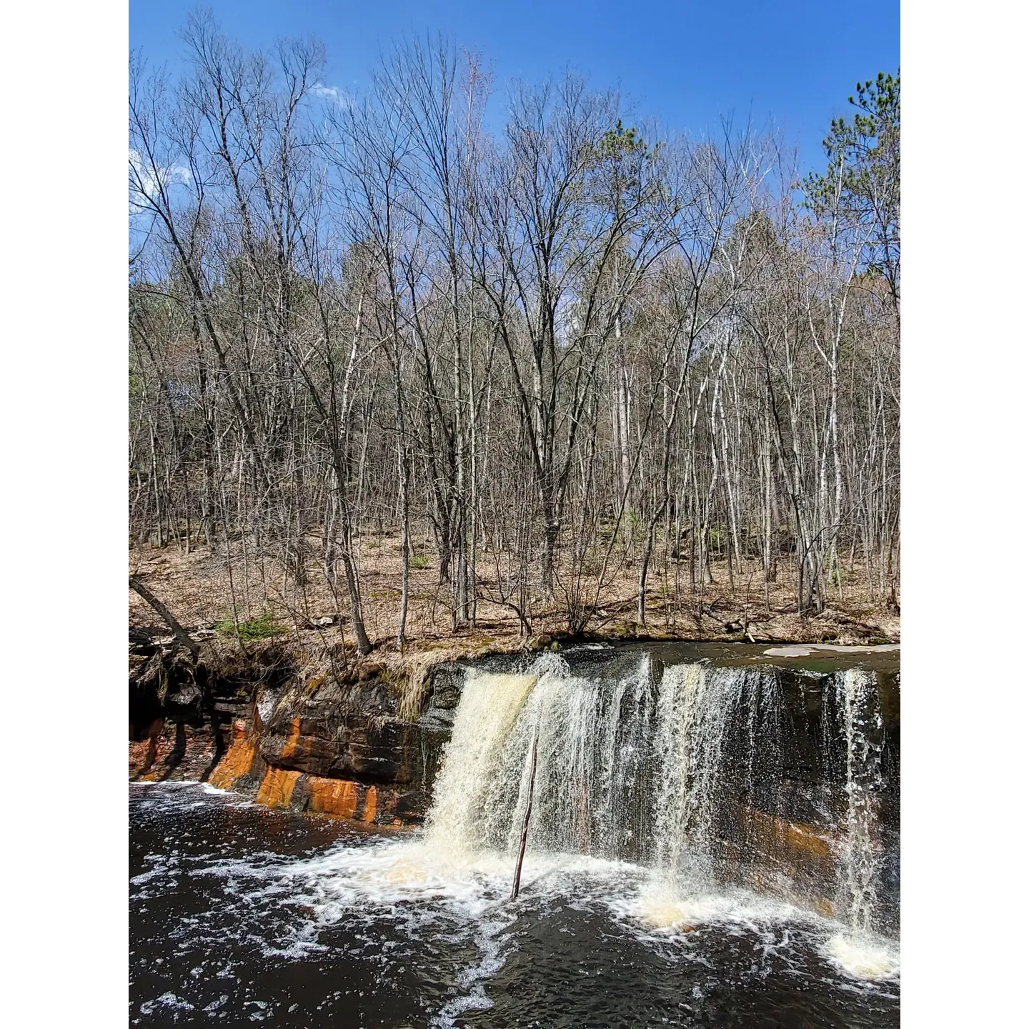 Banning State Park is a treasure trove of natural splendor, known for its remarkable landscapes and rich palette of outdoor activities. With the Kettle River cutting through the heart of the park, visitors are captivated by the stunning rapids that carve through ancient rock formations, creating a dramatic backdrop for adventurers and nature lovers alike.

Thrill-seekers and tranquility hunters alike find solace in the park's diverse trails, which offer both serenity and challenge. Travelers are invited to park in the designated picnic area and set out on a journey of discovery to the famous lookout spot, presenting awe-inspiring vistas that encapsulate the beauty of Minnesota. Whether it's the majestic waterfalls or the enchanting river trails, each path promises a unique experience enveloped in the park's natural grandeur.

The historical significance of the area adds a rich layer to the visitor experience, with well-marked trails leading explorers through time and nature. The park's cleanliness and clarity of signage ensure a seamless and enriching day out, whether one chooses to immerse in a brief escape or a full day of exploration.

With hiking trails designed to cater to a wide array of skill levels, Banning State Park ensures that everyone, from seasoned hikers to casual strollers, can find their perfect path. The harmonious blend of the park's captivating beauty and the opportunity for boundless discovery makes it a destination that calls to the hearts of those who have visited, leaving an indelible mark and a yearning to return.

Embraced by a community of enthusiasts who cherish the park's array of offerings, Banning State Park stands out as a must-visit locale that promises an unforgettable experience with every visit, inviting visitors to bask in the scenic splendor and explore the wonders hidden within its lush, inviting landscape. Description by ChatGPT.