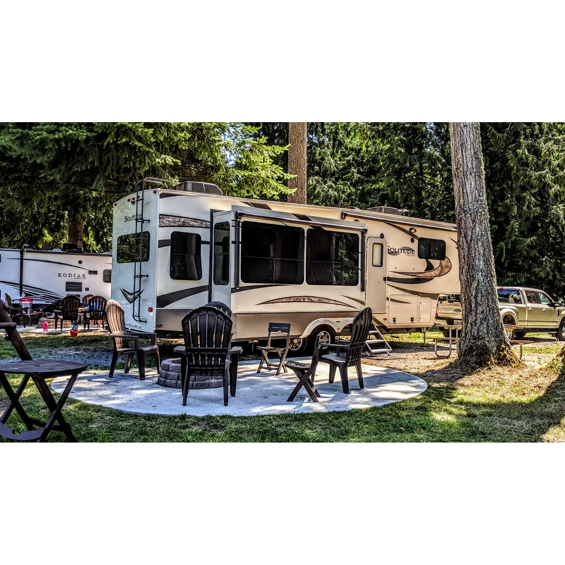 Experience the great outdoors like never before at Grandy Creek Thousand Trails, a serene and spacious campground embraced by the majestic presence of MT Baker and the North Cascade National Park. Here, you can immer to reconnect with nature and indulge in an array of outdoor adventures.

In collaboration with KOA, the site offers an ample selection of campsites that cater to various preferences, from the lush forest settings to creekside spots that bring the tranquility of nature right to your doorstep. Guests are welcomed by sprawling lawns that create a picturesque and inviting atmosphere, a delightful setting for everything from family picnics to stargazing.

The campground is a haven for trail and hiking enthusiasts, with easy access to scenic bicycle paths that weave through stunning landscapes. A pet-friendly environment features a playground tailored for your furry companions, complete with wooden chips to keep them engaged and safe.

Individuals seeking convenience while amidst nature will appreciate the individual bathrooms that are securely lockable, offering privacy and comfort. Additionally, staying connected and clean is simple with the 24-hour laundry facility available on-site.

For families, Grandy Creek Thousand Trails does not disappoint. The playground is equipped with a jumping pillow that promises hours of fun. Organized crafts and activities keep spirits high, and the on-site swimming pool offers leisure and relaxation in a beautiful mountain setting.

The friendly staff works diligently to ensure guests' needs are met, contributing to an environment where joy and contentment are paramount. Larger open field spaces offer room for activities like horseshoes and mini-golf, enhancing the communal outdoor experience.

Whether you're looking for a family-friendly destination with structured activities or seeking the serenity of a spacious, clean campsite in the proximity of exceptional natural attractions, Grandy Creek Thousand Trails provides an ideal getaway. Its strategic location, coupled with thoughtful amenities, makes it a frequently revisited destination for those who cherish both nature and comfort. Description by ChatGPT.