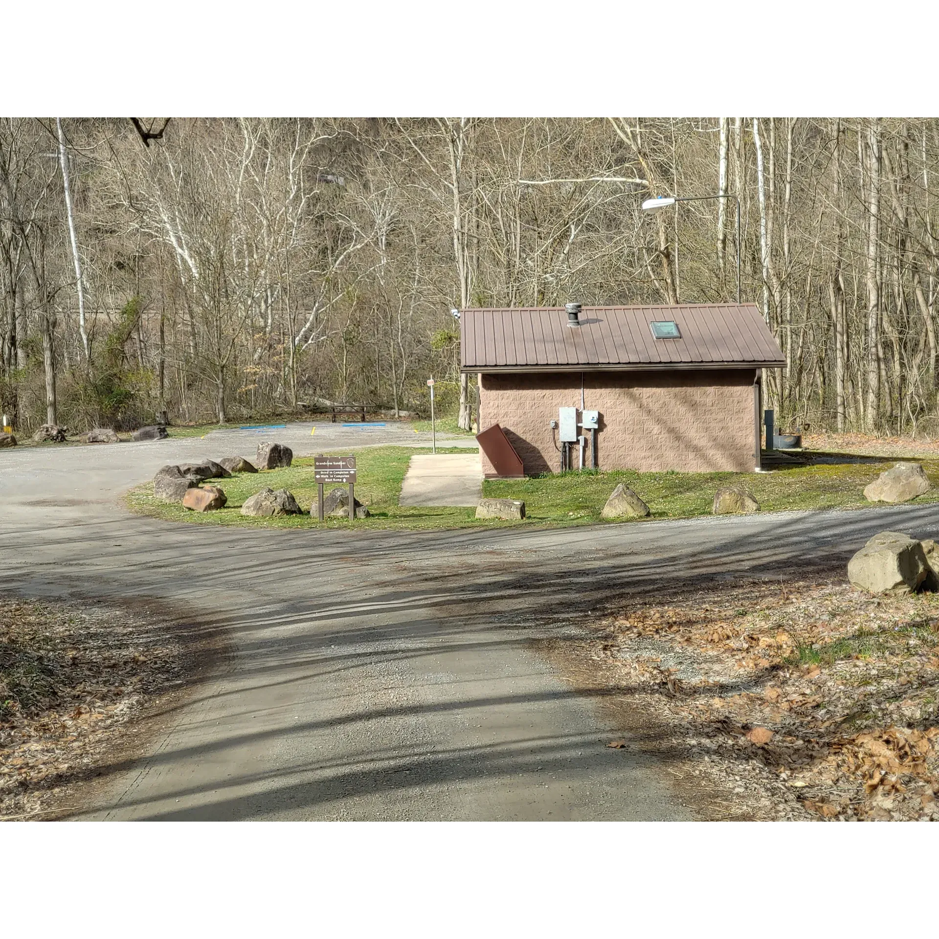 Grandview Sandbar Campground is a serene and scenic retreat located in the proximity of the New River, offering visitors a tranquil experience at no cost. The campground caters to a variety of camping styles including small RVs, pop-ups, teardrops, and tents, with both primitive and walk-in sites available. Each campsite is equipped with a picnic table and fire ring, ensuring a comfortable and authentic outdoor experience.

Visitors are welcomed by the remarkable views of the surrounding landscape and the soothing sounds of the river, making it an outdoor enthusiast's paradise. The site is conducive to a multitude of recreational activities, with several hiking trails nearby, providing ample opportunities for exploration and adventure. For those who appreciate the simplicity of nature, this campground delivers an unspoiled setting to relax and connect with the environment.

The campground prides itself on being dog-friendly, allowing you to enjoy the company of your furry companions as you explore the beauty of nature together. Facilities include well-maintained vault toilets for convenience, and accessibility is considered with handicapped spots near the walk-in sites.

With sizable sites along the New River's bank, plenty of space is assured for guests seeking a less crowded atmosphere. Despite its popularity, visitors report that arriving early can secure a prime spot even during peak seasons. Additionally, the availability of a sizeable parking lot enhances the ease of river access.

For those who appreciate the raw beauty of nature with basic amenities to ensure comfort, Grandview Sandbar Campground is an exceptional choice. First-time visitors and seasoned campers alike praise the site for its peaceful environment, with many eager to return, affirming its status as a cherished location for generations of outdoor lovers. Description by ChatGPT.