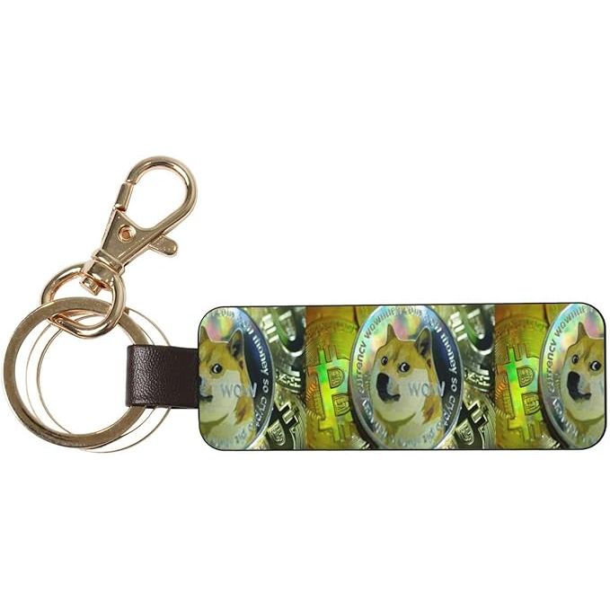 The PC Leather Keychain Dogecoin-Shiba-Inu-Bitcoin Novelty Key Holder Key Fob is a unique and stylish keychain designed for cryptocurrency enthusiasts. Made of high-quality PC leather material, this keychain features a design that combines the logos of Dogecoin, Shiba Inu, and Bitcoin for a fun and eye-catching look.