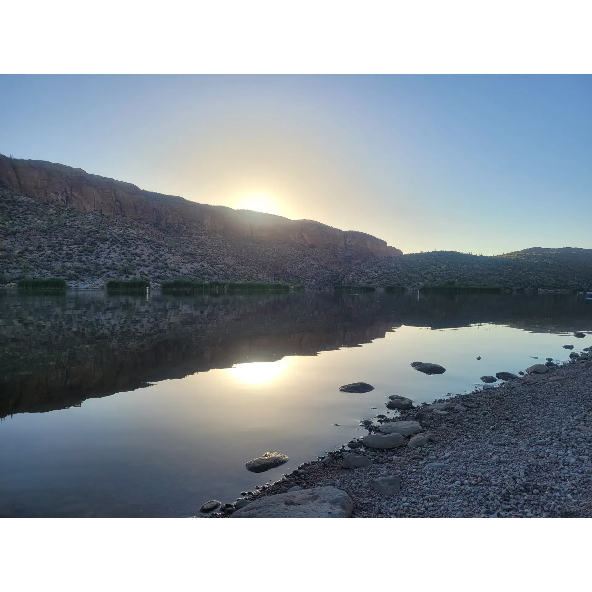 Canyon Lake Campground offers a serene retreat for outdoor enthusiasts looking to immerse themselves in the tranquility of waterfront camping. Boasting enchanting panoramic views of the natural landscape, this campground provides guests with direct lake access, making it an ideal spot for an array of water-related activities.

Each camping space is thoughtfully positioned to maximize the enjoyment of the lake's soothing presence, ensuring a peaceful and easy-going experience amidst nature's splendor. It is the perfect choice for weekday escapes, where the quiet atmosphere allows visitors to relax fully and enjoy the undisturbed beauty of the surroundings.

Visitors have the convenience of electric and water hookups at each campsite, which despite the modest additional cost, contribute significantly to a comfortable and well-equipped outdoor stay. The campground maintains clarity after dusk with strategically placed street lights, enhancing safety and navigation during evening hours.

For the adventurously inclined, kayaking opportunities are abundant, with early mornings on the lake providing a particularly enchanting setting with fewer boats and calmer waters. The proximity to the shimmering water invites both sunrise enthusiasts and those seeking a leisurely paddle under the vast Arizona sky.

Canyon Lake Campground is also pet-friendly, welcoming furry friends to join in the fun and bask in the openness of the outdoor environment. This ethos of friendliness extends to the community of visitors, where dog owners are considerate, ensuring a harmonious experience for all pets.

While venturing off the beaten path, visitors should remember to come prepared, bringing supplies to enhance their stay at this scenic getaway. With thoughtful preparation, campers are sure to create lasting memories while enjoying the breathtaking views and the calm, clear waters of Canyon Lake. Whether seeking a solo retreat, a romantic sojourn, or a family adventure, this campground serves as an idyllic backdrop for a refreshing and fulfilling outdoor escape. Description by ChatGPT.