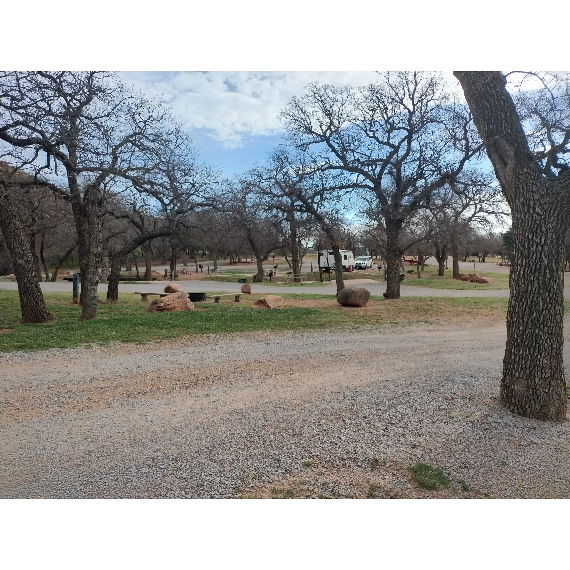 Redbud Campground is a popular campground located in Lone Wolf, Oklahoma. The campground offers a variety of amenities for campers, including 30 RV sites with electric hookups, picnic tables, and fire rings. The campground also features a hiking trail, playground, and a swimming beach on the nearby Lake Altus-Lugert.

Visitors to Redbud Campground can enjoy a peaceful setting surrounded by scenic views of the lake and surrounding nature. The campground is pet-friendly, making it a great destination for families and outdoor enthusiasts looking to explore the area with their furry friends. Additionally, the campground is conveniently located near the Quartz Mountain State Park, which offers additional recreational activities such as fishing, boating, and golfing.

Overall, Redbud Campground provides a tranquil and picturesque setting for camping and outdoor activities in southern Oklahoma. Whether you're looking to relax by the lake, explore the surrounding trails, or simply enjoy a peaceful getaway in nature, Redbud Campground offers a welcoming and scenic destination for campers of all ages. Description by ChatGPT.