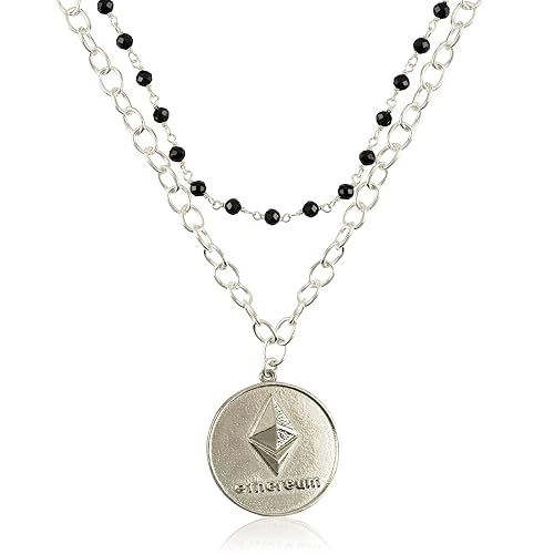 The Alpha Black Spinel Beads & Ethereum Charm Pendant Necklace is a stylish and trendy piece of jewelry designed for women. It features a layered design with black spinel beads and a delicate Ethereum charm pendant, adding a touch of elegance to any outfit.