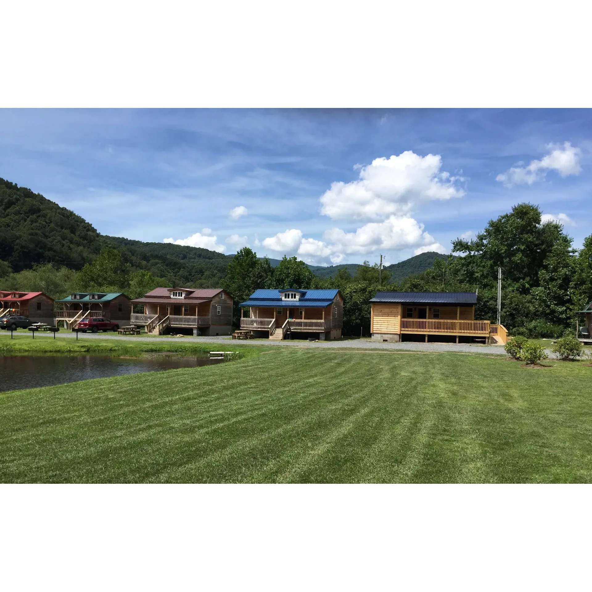 Buck Hill Campground emerges as a premier destination for outdoors enthusiasts seeking tranquility and excitement in equal measure. It boasts a splendid location along the North Toe River, providing an idyllic setting for fly fishermen with an abundance of both stocked and native trout. Recognized for exemplary customer service, guests feel warmly welcomed by staff, including Chris and the owners, who go the extra mile to ensure a memorable stay. The camaraderie cultivated here turns first-time visitors into repeat guests, eager to bring their families to share in the adventure.

The variety of accommodations, including enchanting tiny cabins, caters to a spectrum of preferences, all complementing the natural beauty of the surroundings. Comfort and cleanliness are cornerstones of the Buck Hill experience, as evidenced by modern and impeccably maintained bathhouses that feature solid surface countertops, rain showers, and luxurious hand wands.

Family-friendly amenities span from playgrounds and an engaging game arcade to a catch-and-release pond teeming with fish, ensuring that younger guests have plenty to explore and enjoy. Sporting enthusiasts can revel in the options available on-site, such as a pickleball court and basketball area. The gathering room adds a social hub with games, TV, and comfortable seating, fostering a convivial environment for all ages.

Beyond recreation, conveniences are in abundance, with the provision of essentials like ice and firewood, while tech-savvy guests can stay connected through exemplary Wi-Fi service, ensuring that even remote work can be handled seamlessly amidst the serene environment. Practical needs are not overlooked with a certified RV Tech available seasonally for repairs, highlighting the thoughtful consideration given to guest comfort.

For nature lovers, the campground offers direct access to scenic hiking trails, including the ascent up Buck Hill Mountain, promising rewarding vistas and a sense of accomplishment. The sprawling campsite spaces often come with delightful additions such as decks with river views, further enhancing the outdoor living experience.

In gratitude to those who have served, Buck Hill proudly extends military discounts and shows profound appreciation for veteran groups through their dedicated support and services. This commitment to giving back adds a layer of heartfelt value to stays at the campground.

A visit to Buck Hill Campground is not just a getaway; it's an immersive retreat into a world of natural splendor and attentive hospitality, where every detail contributes to what many declare to be the finest camping experience imaginable. Whether seeking solitude, family fun, or an angler's paradise, Buck Hill stands out as a cherished destination ready to welcome you to the great outdoors. Description by ChatGPT.