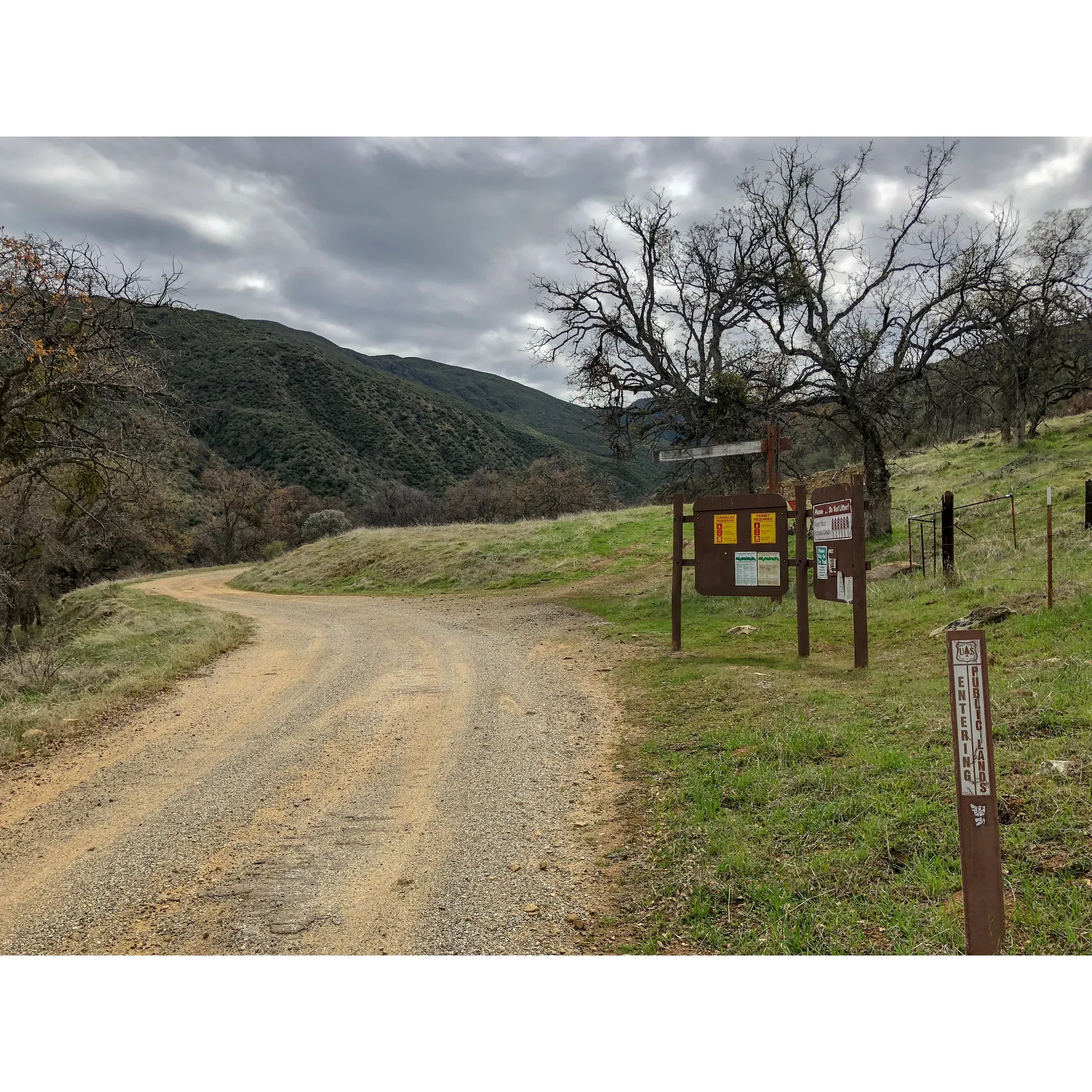 Bates Canyon Campground offers a tranquil retreat for outdoor enthusiasts seeking a picturesque and serene camping experience. Tucked away in steep mountains, this remote and beautiful campground is the perfect destination for nature lovers looking to escape the hustle and bustle of city life.

The campground houses 6 well-spaced picnic tables, providing a personal space for visitors to enjoy their meals amidst the splendor of the surrounding forest. Conveniently located are 2 buildings housing clean pit toilets, catering to the essential needs of campers.

This location boasts an enchanting creek that meanders by, providing a soothing soundtrack to a peaceful stay. The area is further graced with majestic old-growth oak trees that not only offer a canopy of shade but also serve as a natural playground, with certain trees being particularly suited for children to climb and explore.

Visitors have noted that the campground is thoughtfully designed, with tent sites that possess effective drainage, ensuring comfort even during rainy days. The presence of indigenous wildlife is evidenced by tracks that can be found in the vicinity of the campground, allowing for engaging activities such as identifying the various animal prints.

For enthusiasts who enjoy adventure and a bit of isolation, Bates Canyon Campground is a delightful option. Each site, including the beloved Site #2, offers a unique vantage point to take in the scenic beauty and to simply unwind and connect with nature. Whether it's for a weekend getaway or a longer stay, campers are encouraged to bring along their adventure pass and prepare for a memorable outdoor experience at Bates Canyon Campground. Description by ChatGPT.