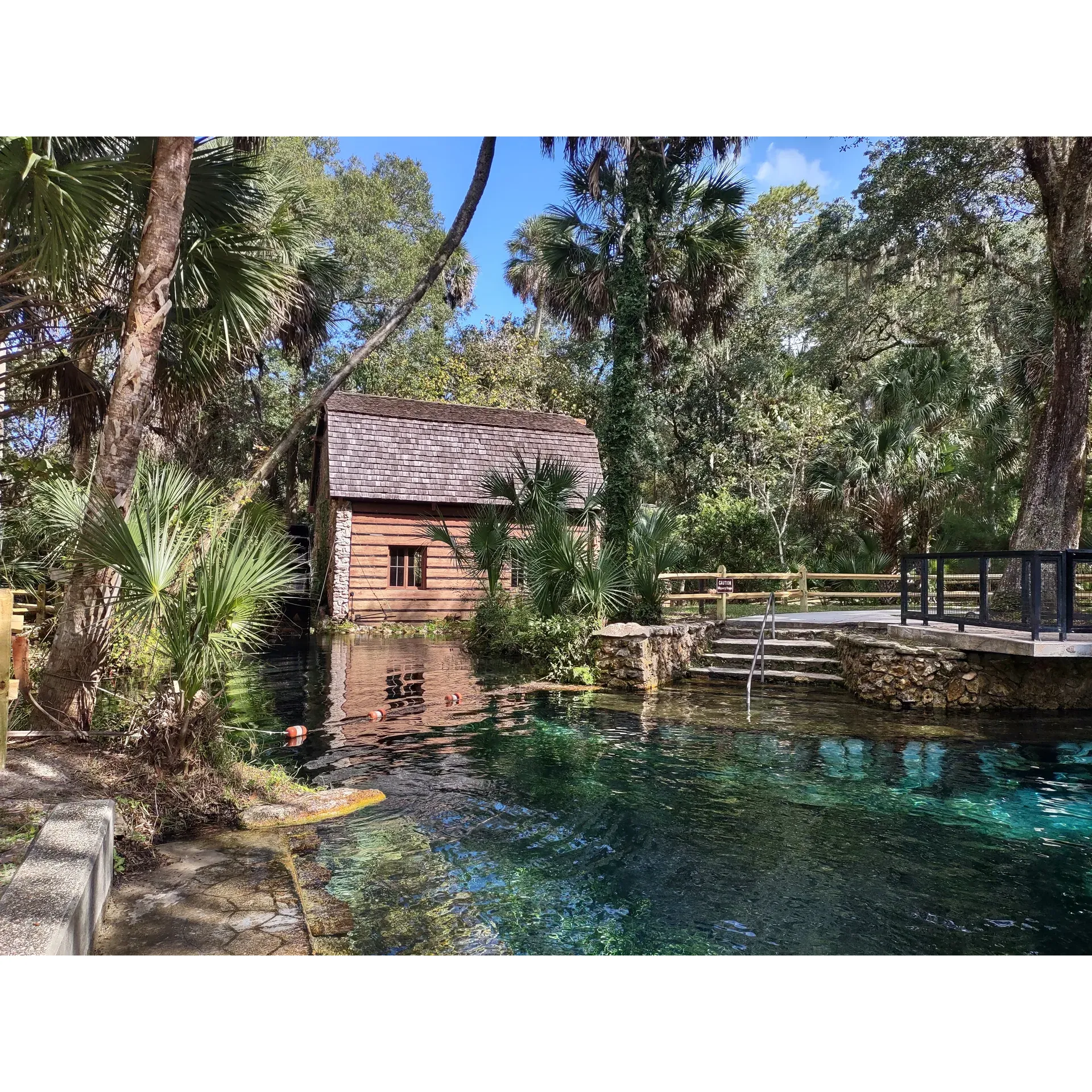 Juniper Springs Recreation Area offers an exquisite outdoor escape within the lush confines of the Ocala National Forest. This picturesque destination draws visitors with its crystal-clear, refreshing waters ideal for a revitalizing swim in the deep, cool embrace of the spring. The spring's perimeter is thoughtfully adorned with strategically placed seating, allowing guests to lounge comfortably in the water and soak up the serene environment.

Adding to its charm, the area features an intriguing old mill exhibit—a nod to its historical significance—that invites exploration and provides a glimpse into the region's storied past. Nearby, convenient amenities include places for grilling, perfect for family picnics or a casual barbeque with friends.

The allure of Juniper Springs is complemented by its family-friendly atmosphere, offering a variety of activities for all to enjoy. Guests can immerse themselves in nature along the well-appointed walking trails, embark on a canoeing adventure, or simply bask in the tranquility of the verdant surroundings.

For those seeking an extended stay, the recreation area boasts proximity to camping spots, ensuring that the natural beauty of the springs is but a stroll away. Visitors can anticipate a retreat that promises relaxation, outdoor recreation, and a chance to connect with nature in a beautiful, well-maintained setting. Whether arriving solo on a weekday for a peaceful getaway or joining others for a weekend adventure, Juniper Springs Recreation Area stands as a beautiful haven, eagerly awaiting all who seek a refreshing outdoor experience. Description by ChatGPT.