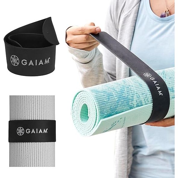 The Gaiam Yoga Mat Strap Slap Band is designed to keep your yoga mat tightly rolled and secure with just one snap. Its strong clasp ensures that your mat stays in place during storage and travel, giving you peace of mind knowing that your mat is secure. The strap slap band fits most size mats, measuring 20 inches in length and 1.