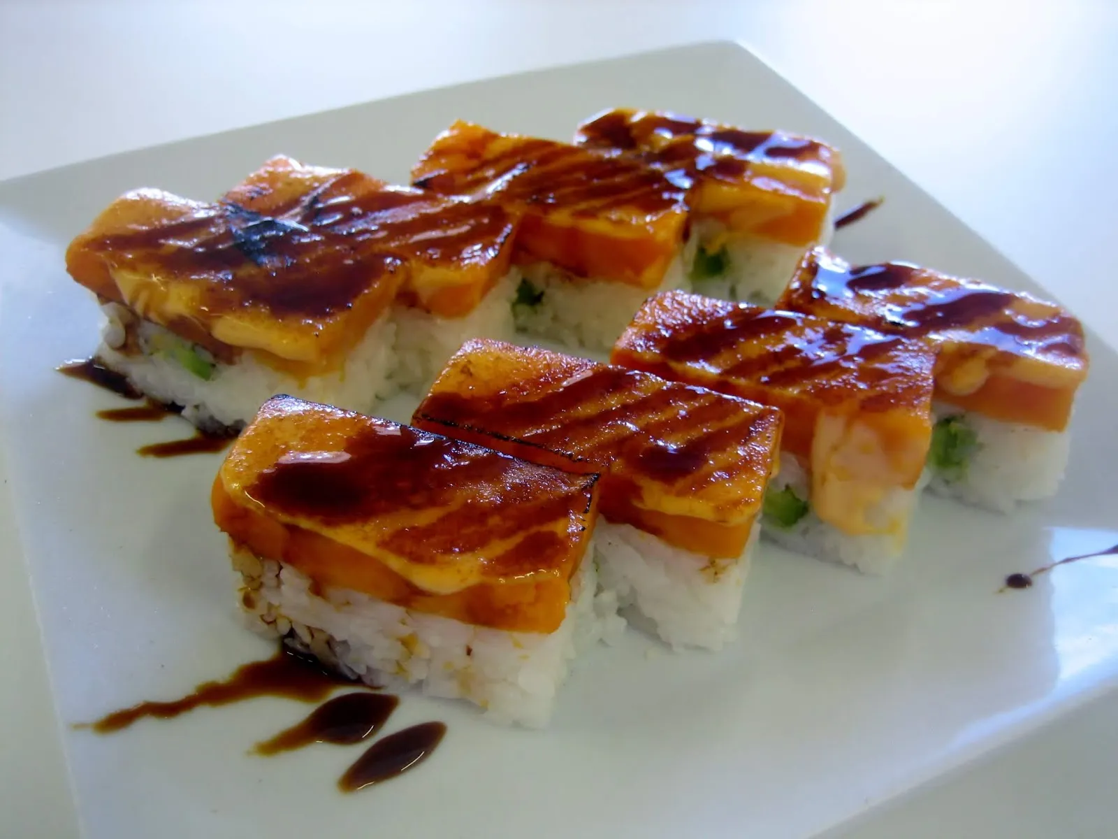 The restaurant takes pride in providing an always amazing dining experience where the quality of the sushi is unparalleled, earning it rave reviews as the go-to destination for authentic Japanese cuisine. From the crowd-pleasing crunchy BBQ salmon roll to innovative creations like flaming-seared yam rolls and the signature 'Best Couple Rolls,' the menu, though concise, is crafted with mastery and served with a personal touch that only a family business can offer.